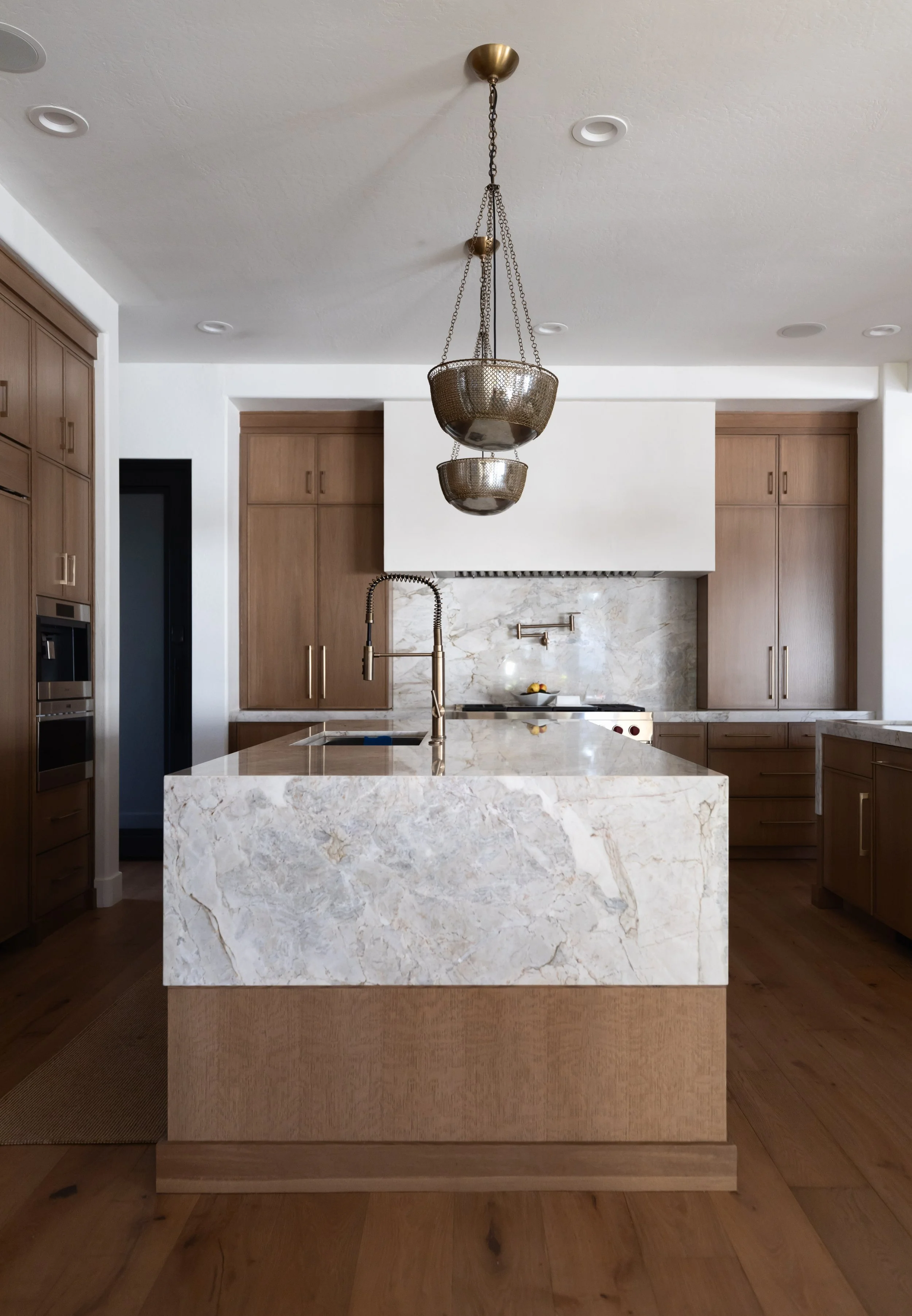 Contemporary kitchen remodel in Phoenix, Arizona featuring clean lines, warm natural finishes, and thoughtfully designed culinary space.