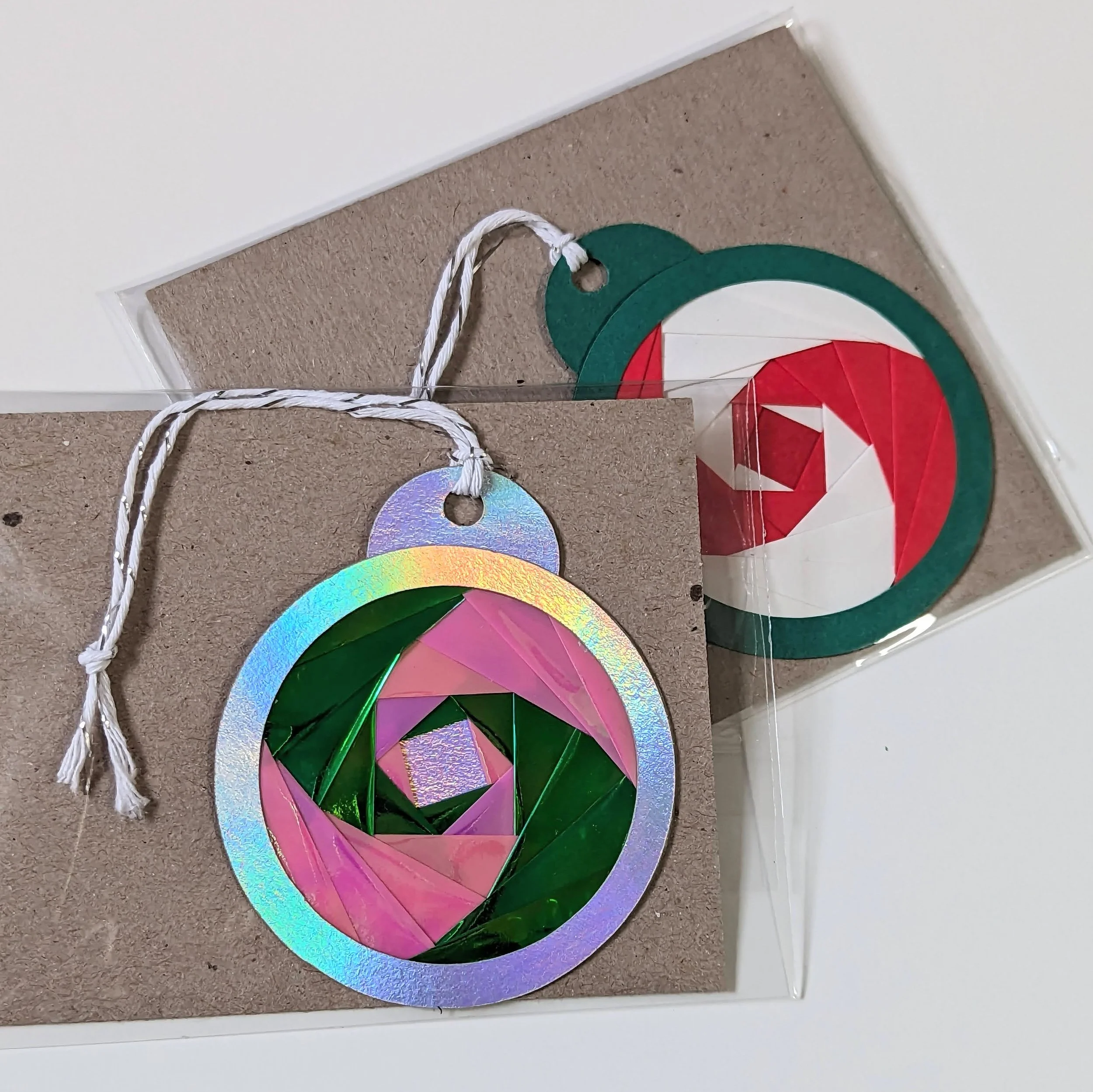 2 iris folded round ornaments