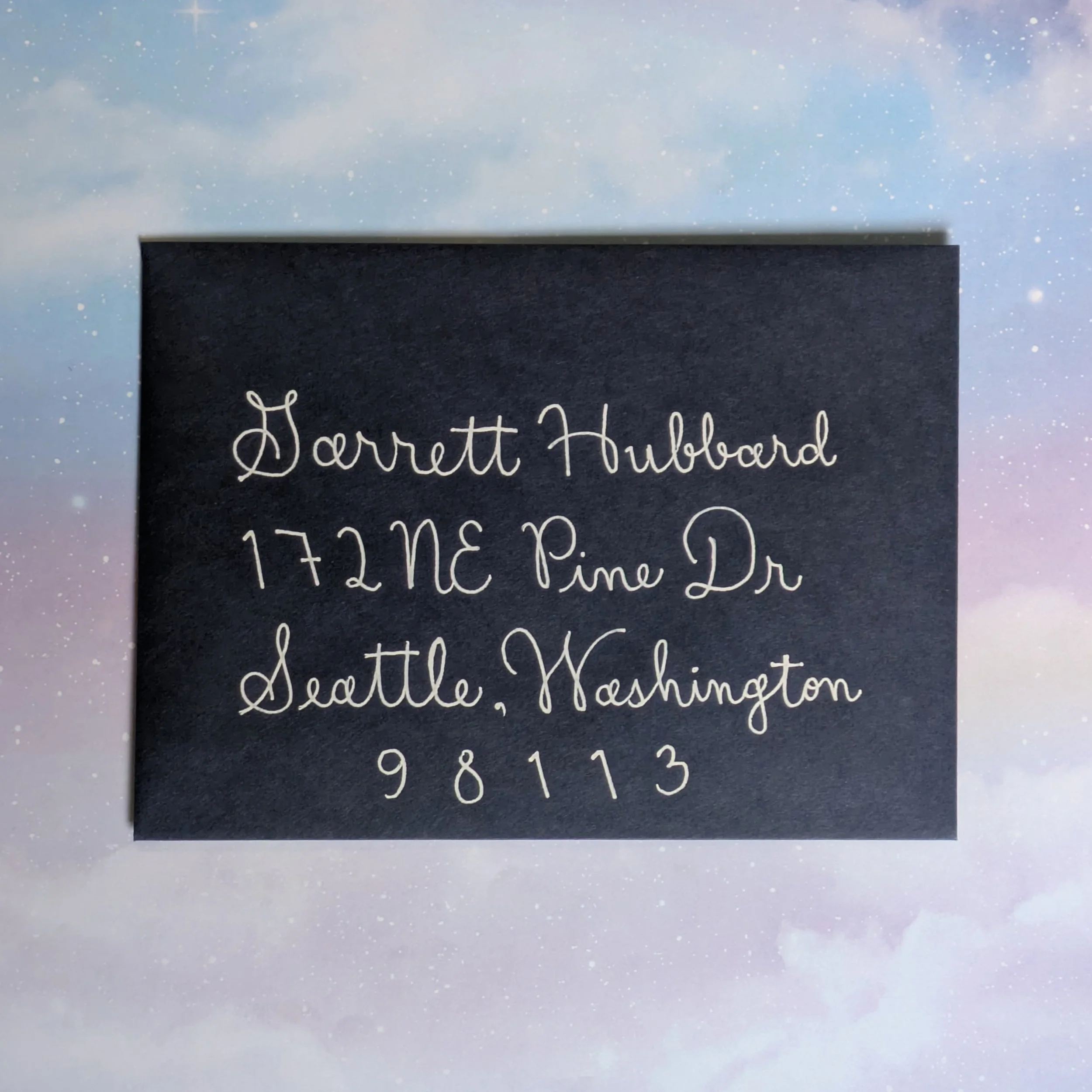 monoline calligraphy addressed envelope