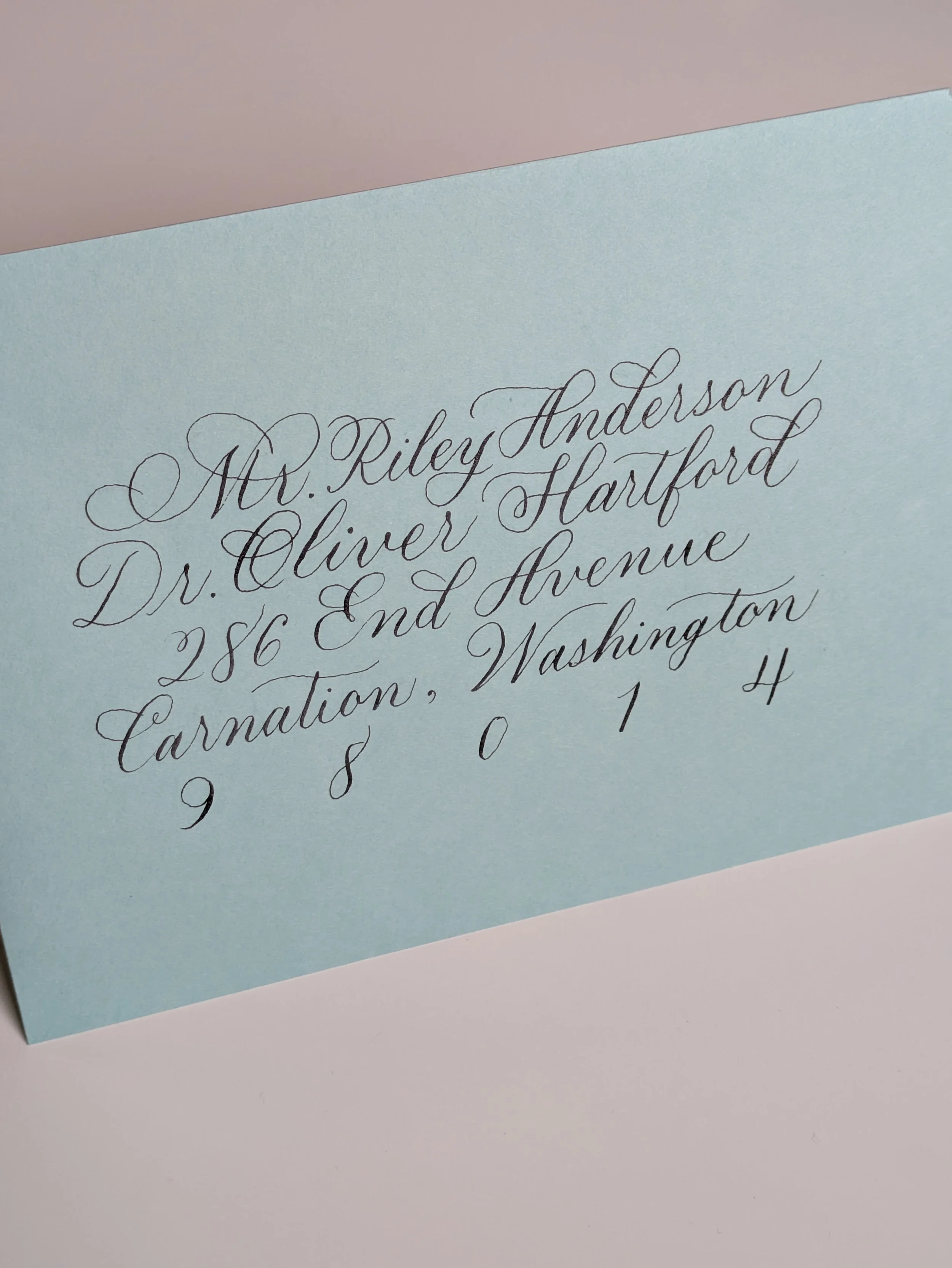 flourished copperplate calligraphy addressed envelope