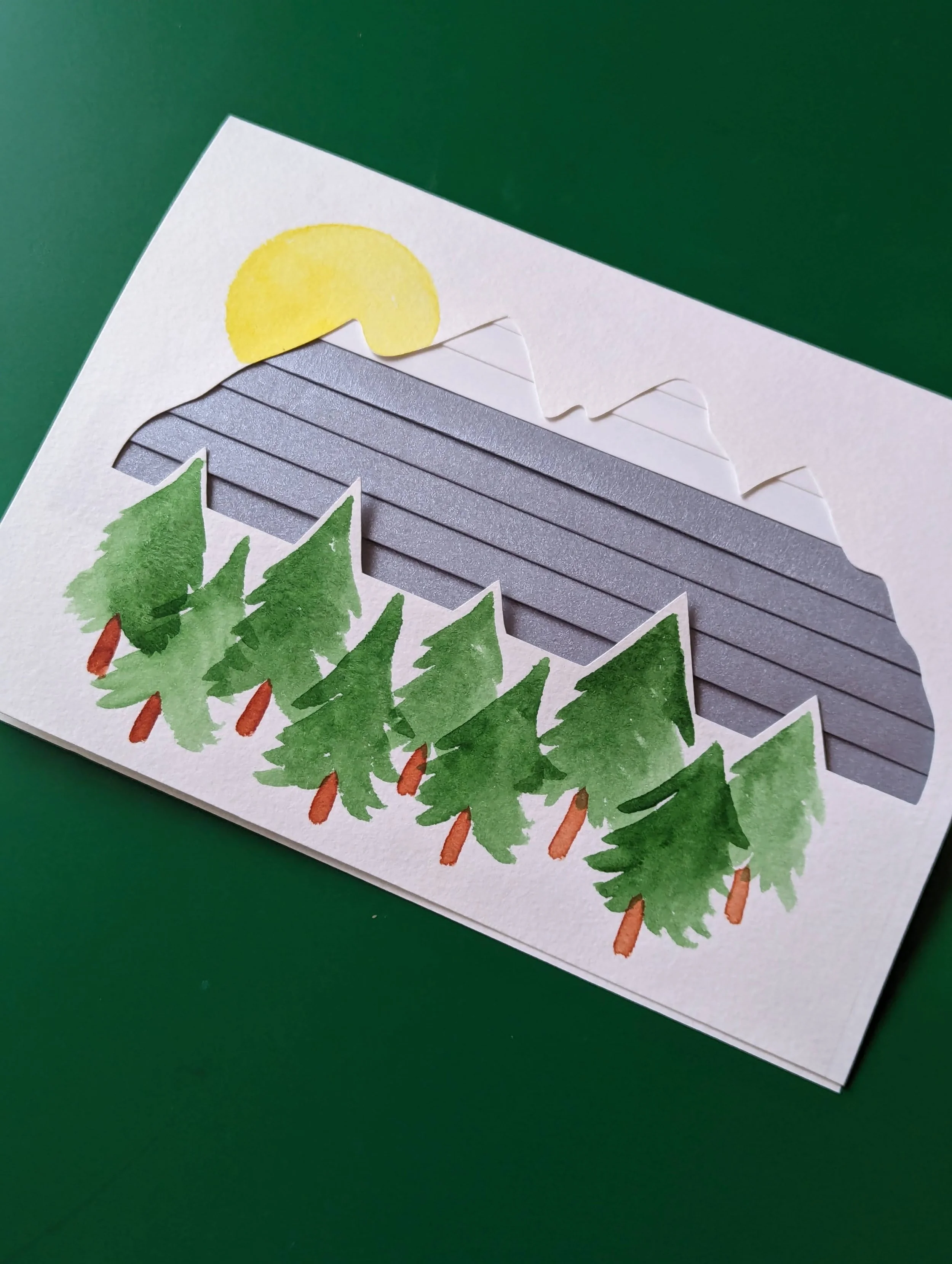 iris folded mountain with tree and sun details