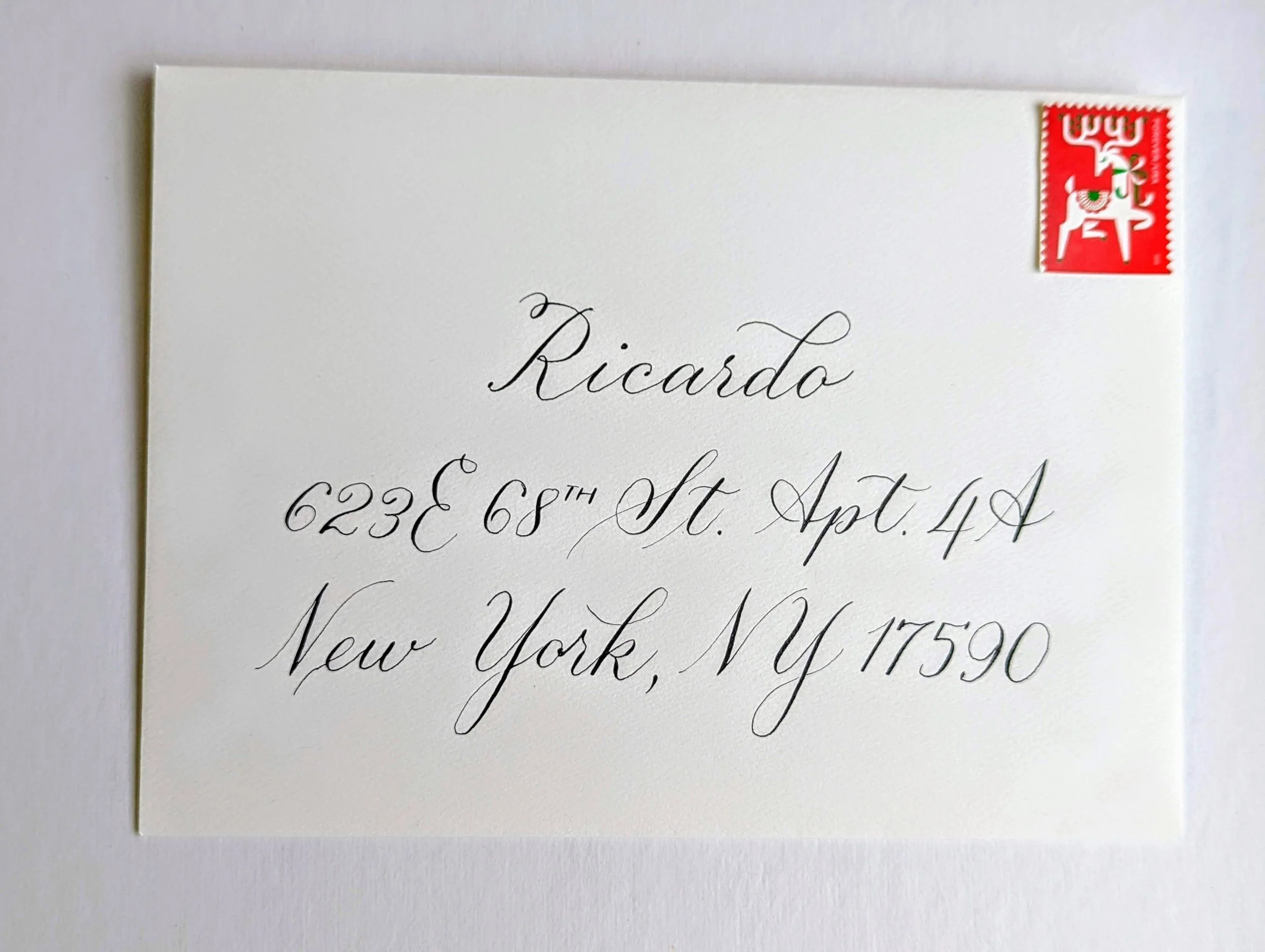 envelope addressed in copperplate calligraphy