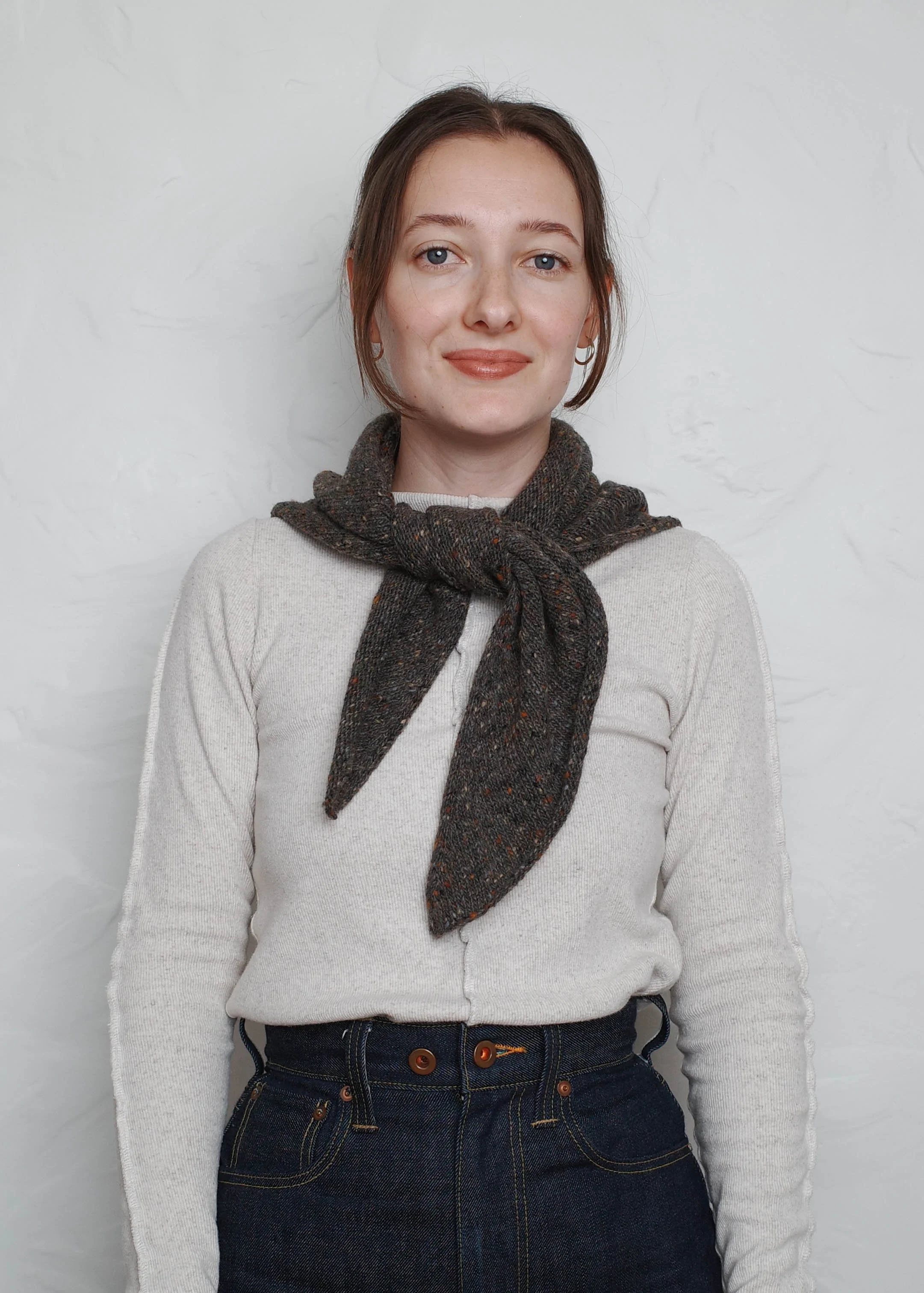 XL Knit Bandana in Umber, tied at the front as a neckerchief