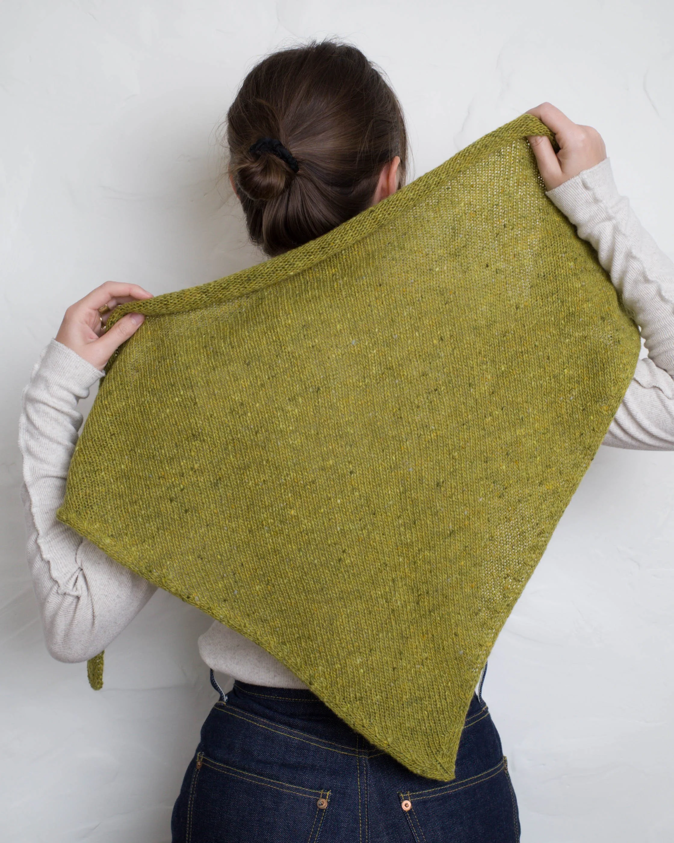 XL Knit Bandana in Lime Green, held open to show its full size, back view