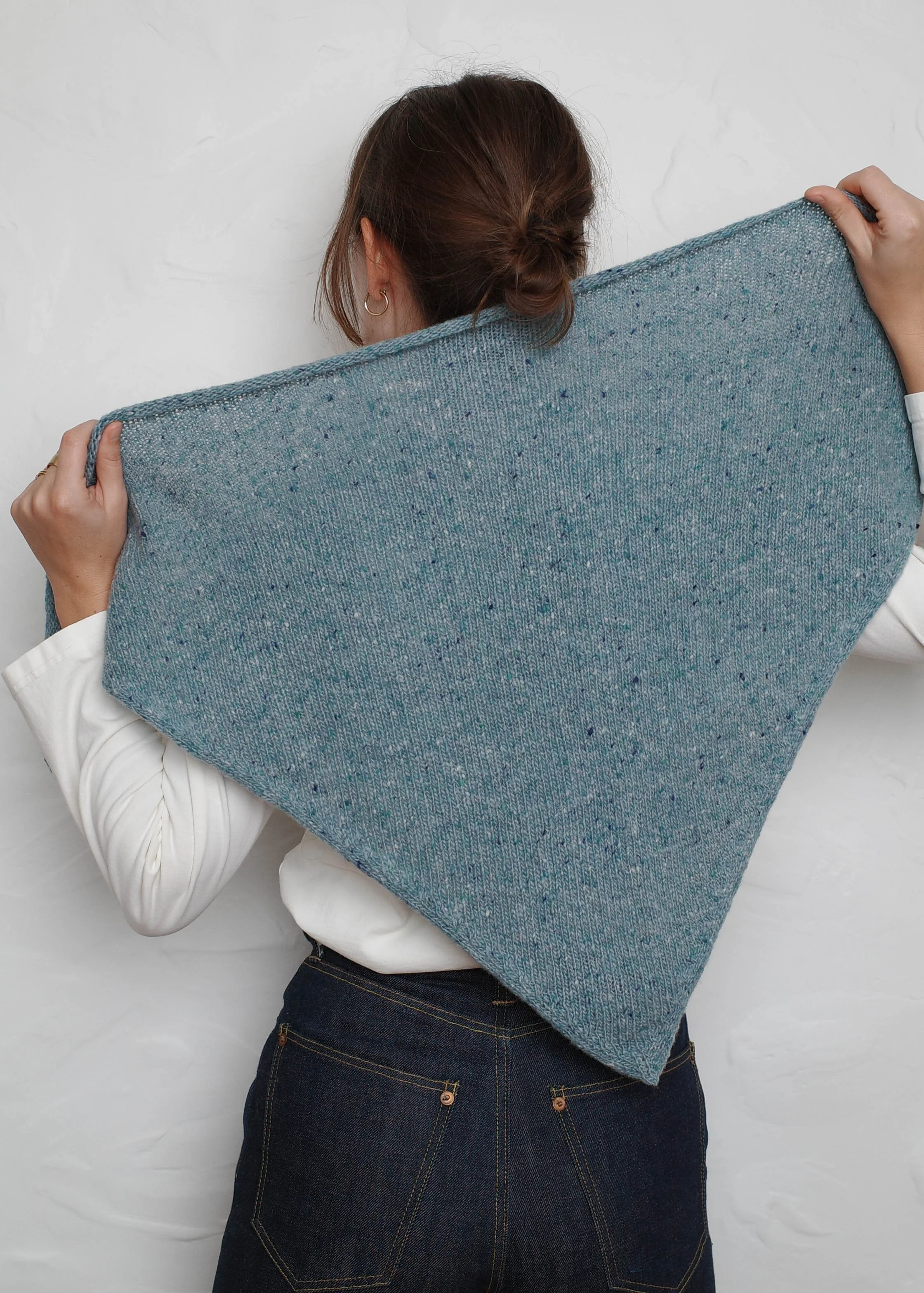 XL Knit Bandana in Sky Blue, held open to show its full size, back view