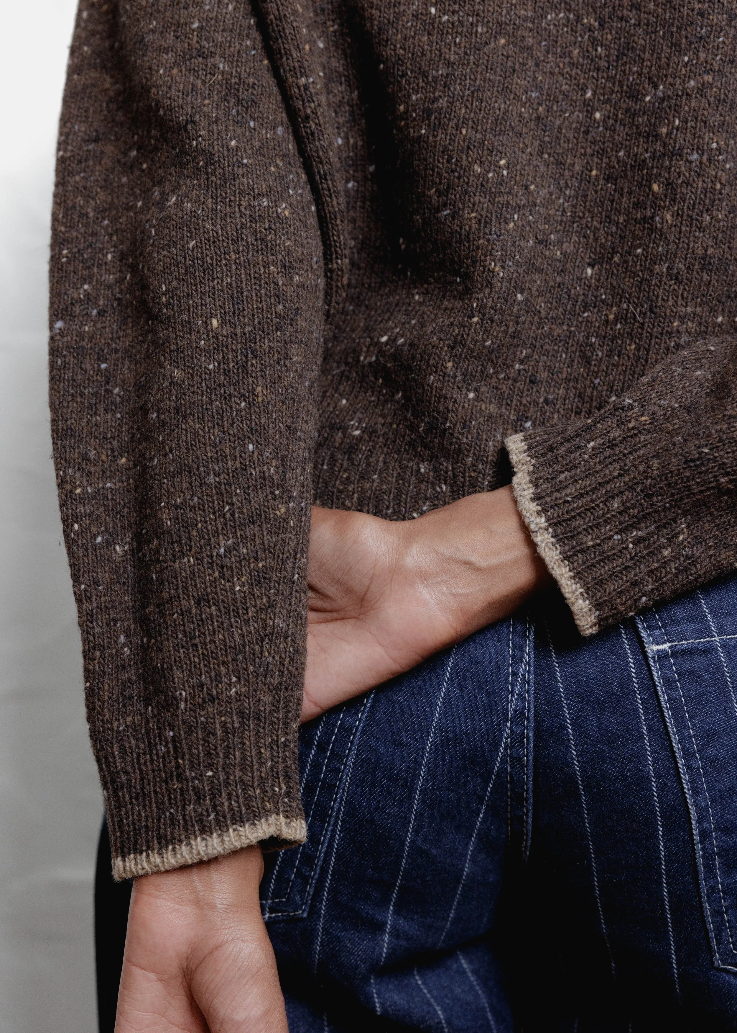 Everyday Raglan sweater in Chocolate, close-up of the cuff with contrast edge