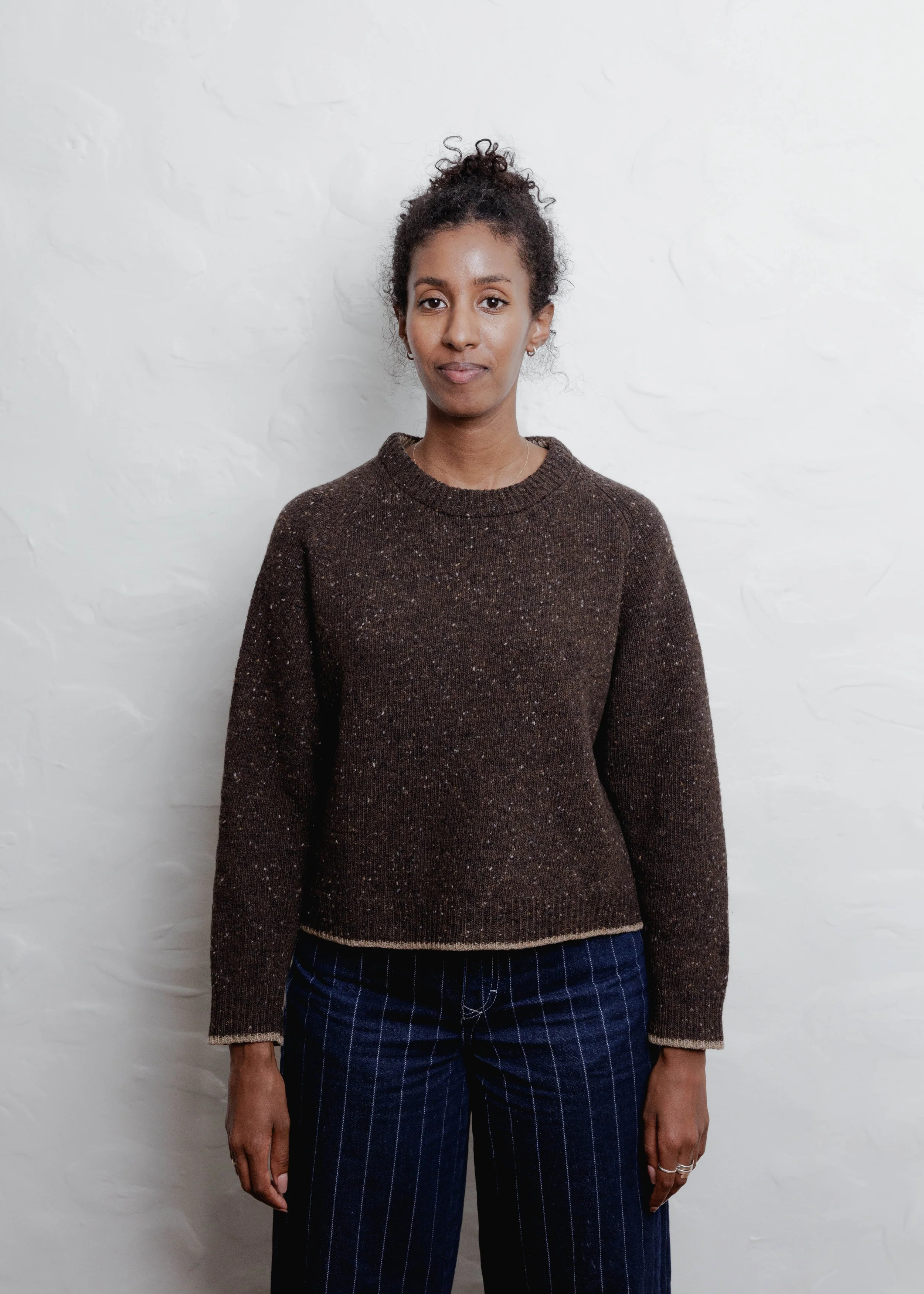 Everyday Raglan sweater in Chocolate, front view on a second model