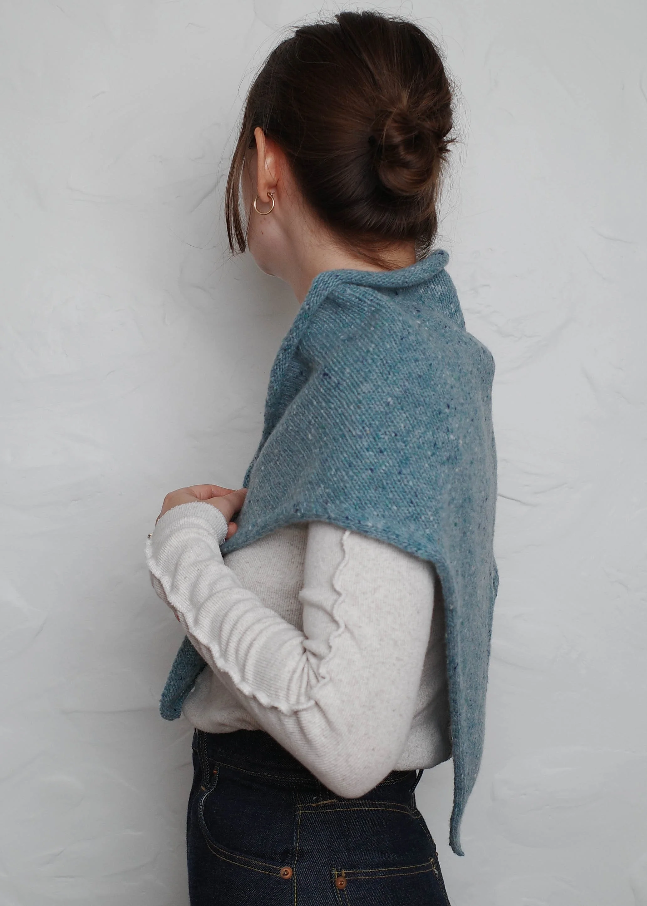 XL Knit Bandana in Sky Blue, worn over the shoulders, side view