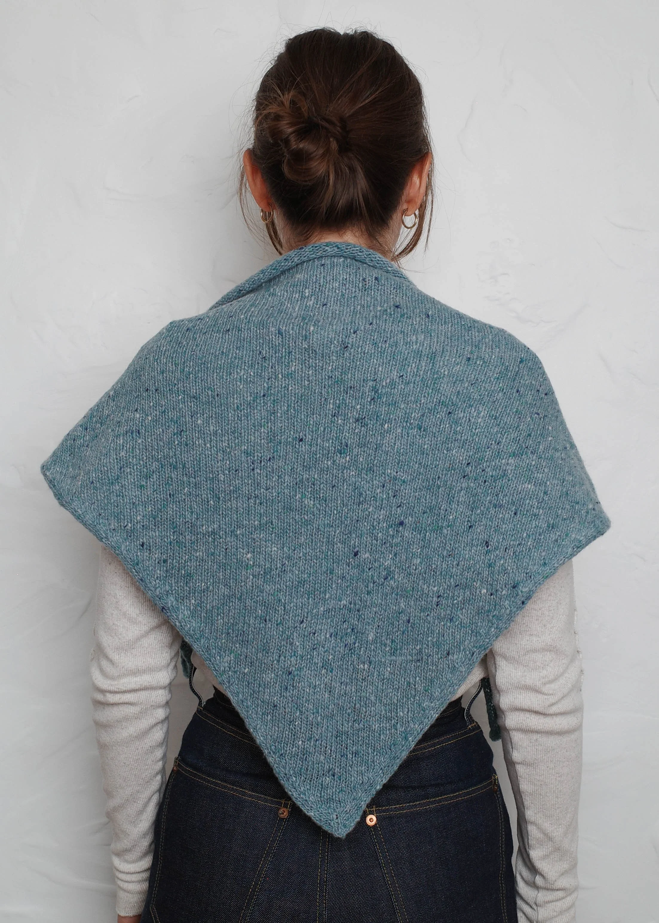 XL Knit Bandana in Sky Blue, draped over the shoulders, back view