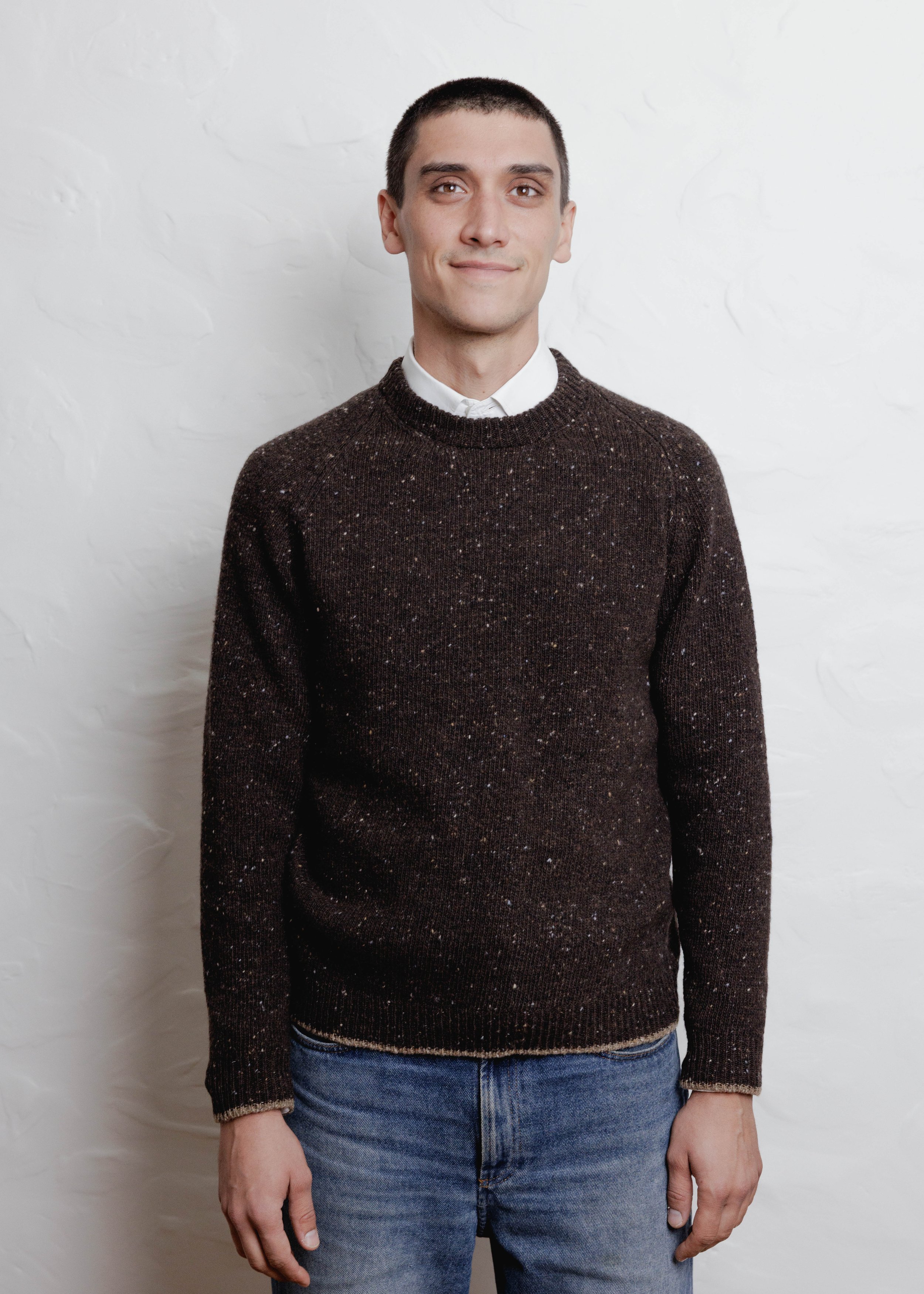 Everyday Raglan sweater in Chocolate, worn over a collared shirt