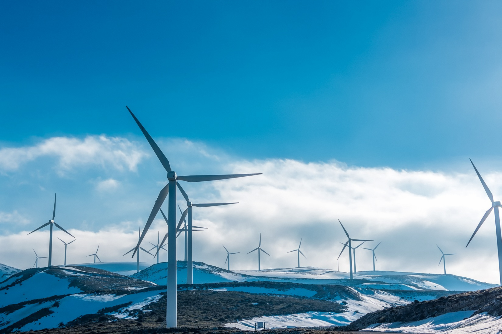 Wind turbines stand resiliently in a snowy landscape.Discover compassionate affair recovery counseling to help you heal in Portland, Oregon. Reconnect and grow together in the 97229 zip code.