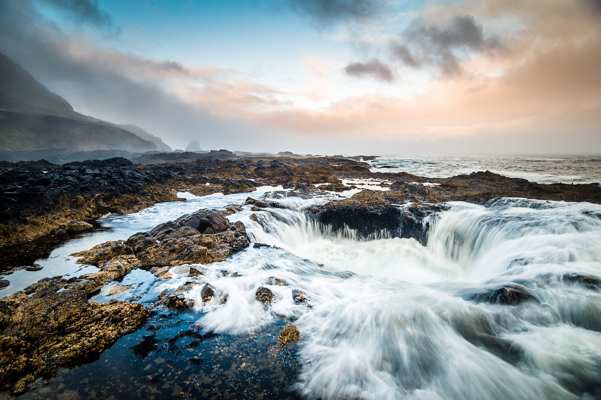 A stormy ocean crashes over dark rocks, a powerful image of emotional overwhelm. Learning the difference between sharing and trauma dumping is key. Our advice on relationships in Portland, Oregon, can help guide you. Serving the 97210, 97035, 97229