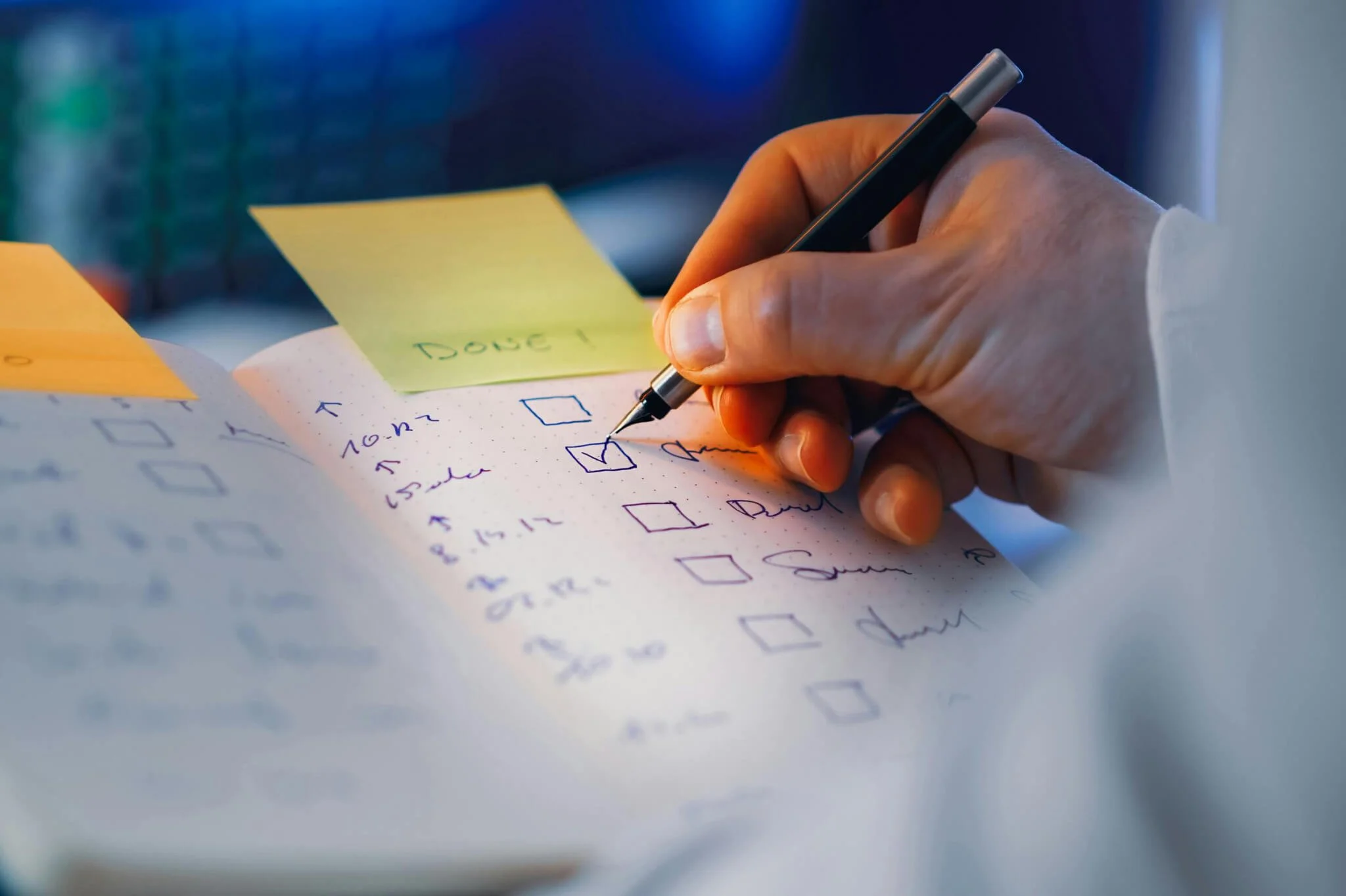 An individual checking off a box in his to-do list. Representing how workplace anxiety therapy in Seattle, WA is here to support you when talking to your employer about anxiety. Learn more here!