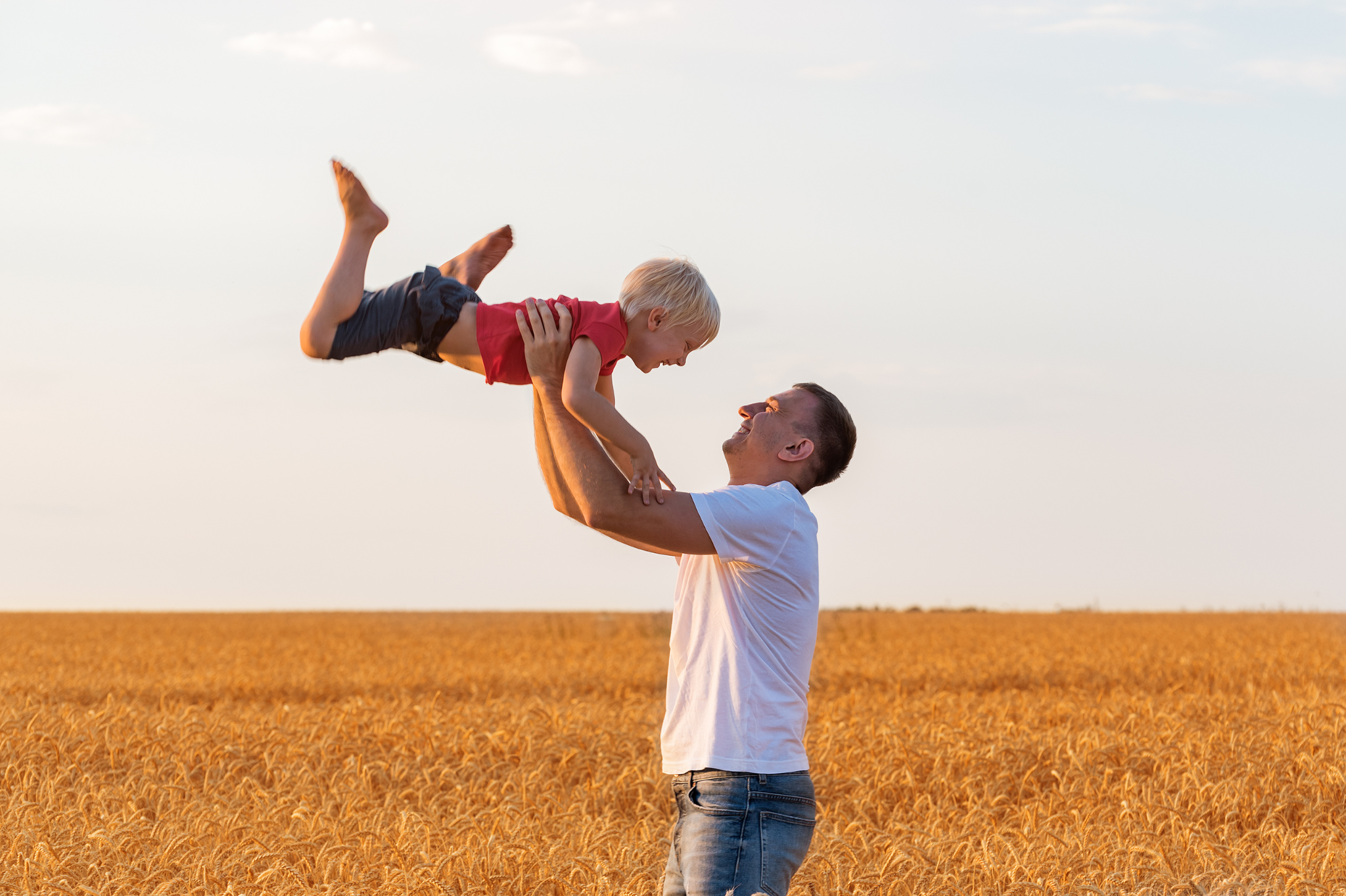 A father lifts his son joyfully in a field, a picture of secure connection. Learn how to therapist relationship anxiety with dating therapy in Portland, Oregon, and create your own moments of happiness. We serve zip codes 97214 and 97210.