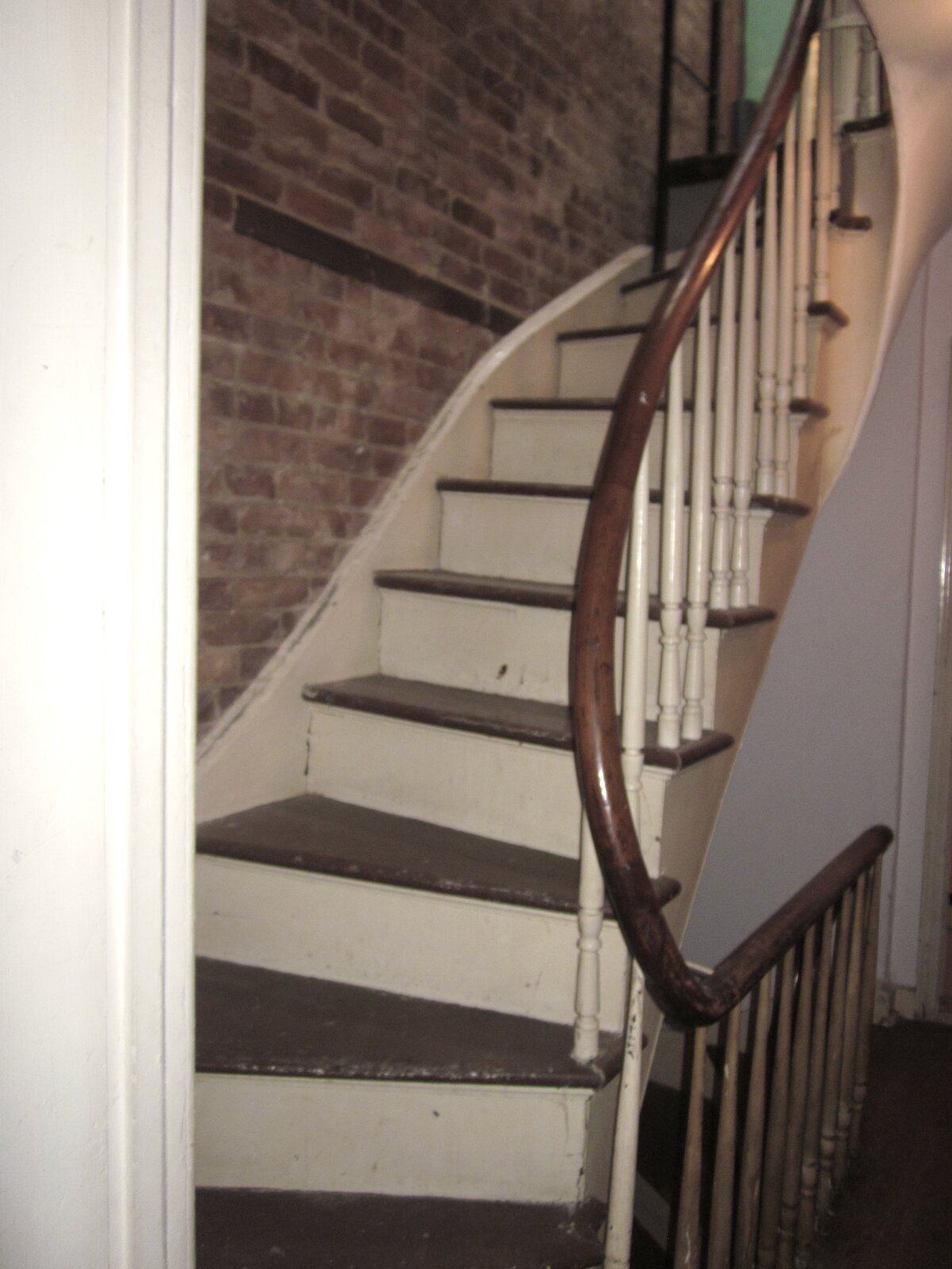  Before: Existing staircases had curved handrails and spindle balusters. 