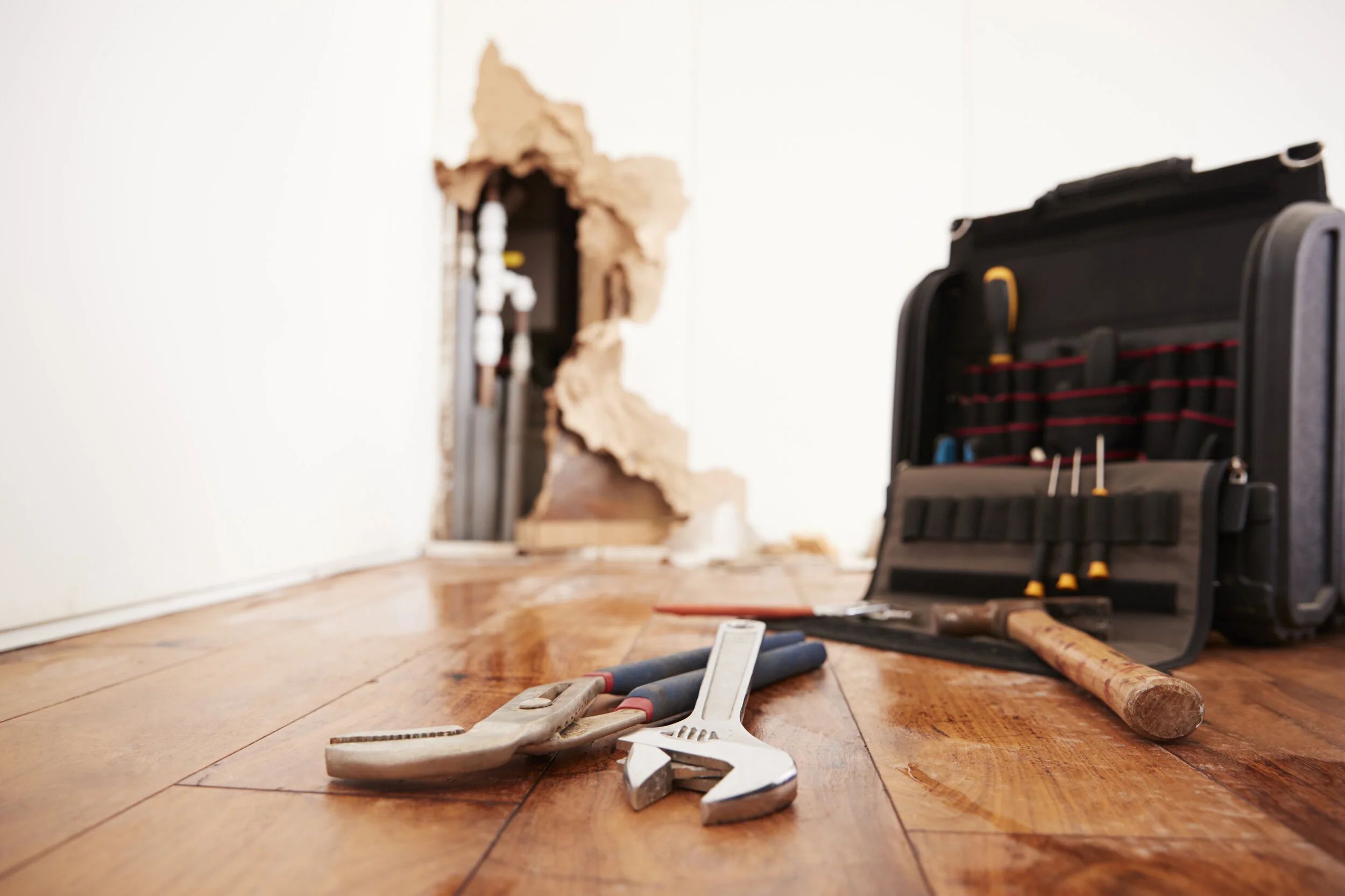 tools-and-toolbox-lying-on-flood-damaged-floor-PVNFHME.jpg