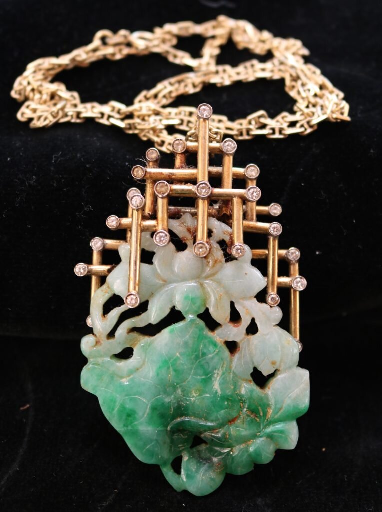 18k and Carved Jade Necklace: $6,000