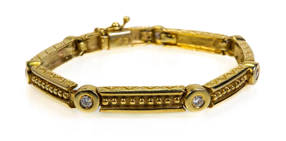 Lot 157: 14k Diamond Bracelet