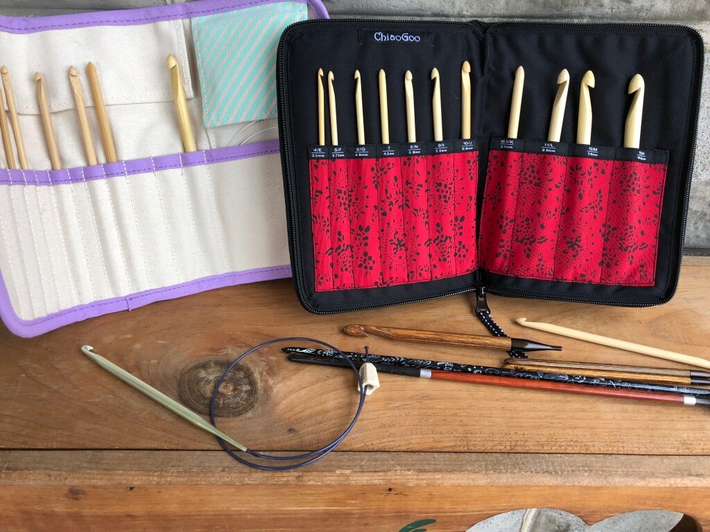 Clover Interchangeable tunisian crochet hook set (left), Chiaogoo TSPIN interchangeable tunisian crochet hook set (right) and assorted other tunisian crochet hooks - straight, double ended, and Knitter's Pride Interchangeable.