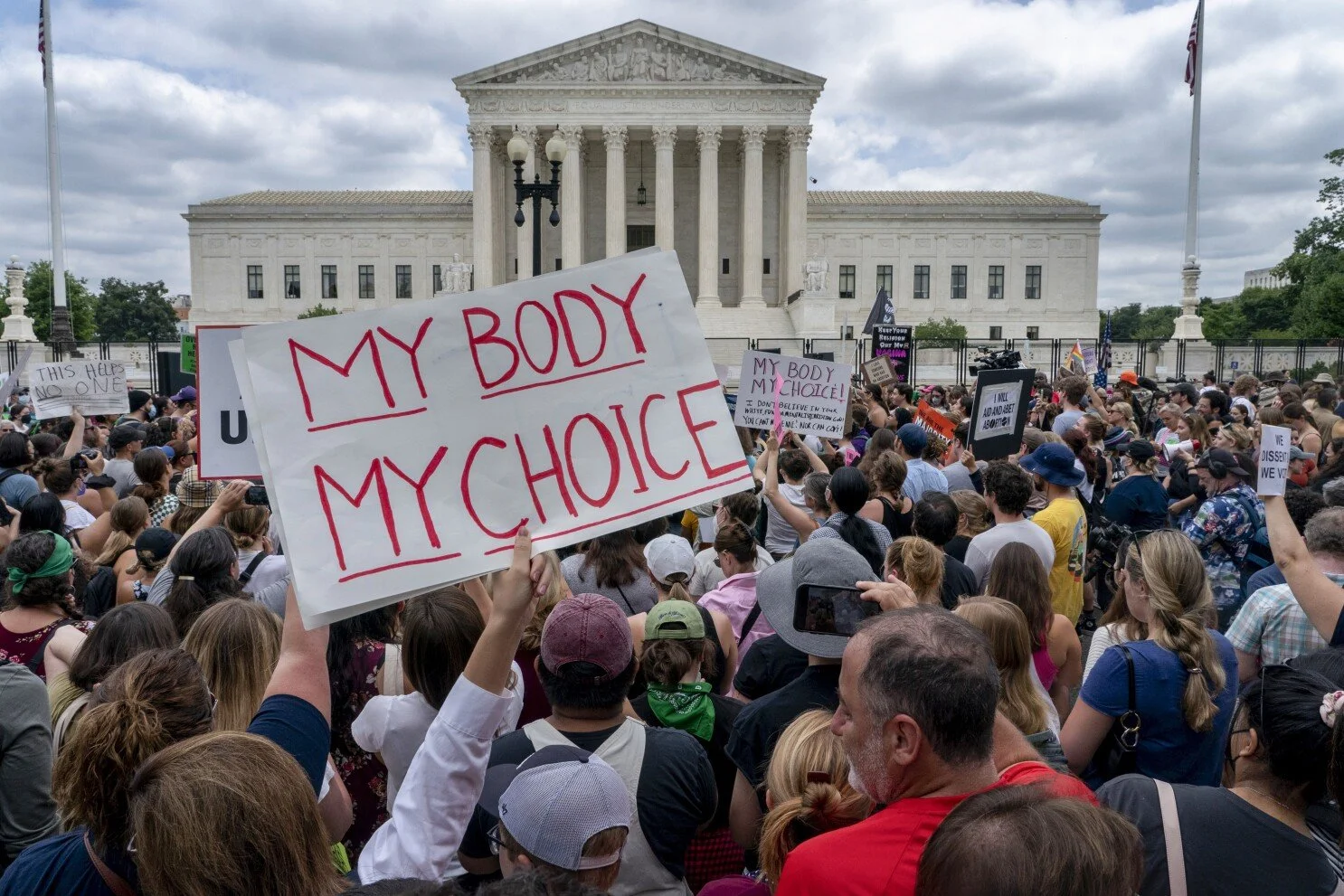 Protesters rally in front of the Supreme Court in Washington D.C following the court’s decision to overturn Roe v. Wade, federally protected right to abortion.