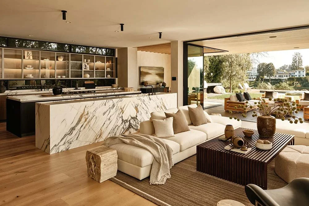 Interior of Pacific Palisades joint venture luxury home featuring eco-friendly design, open living space, and expansive outdoor amenities.