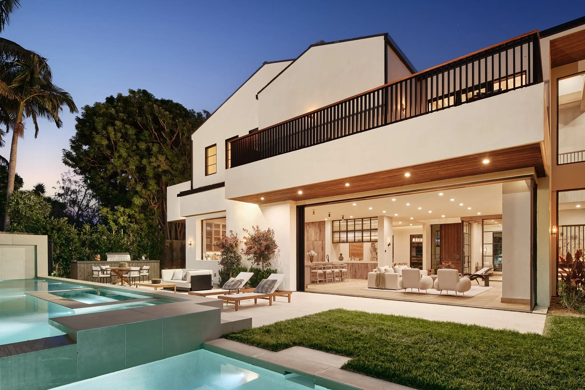 Elaborate swimming pools and patio of a custom-built luxury home in West LA.