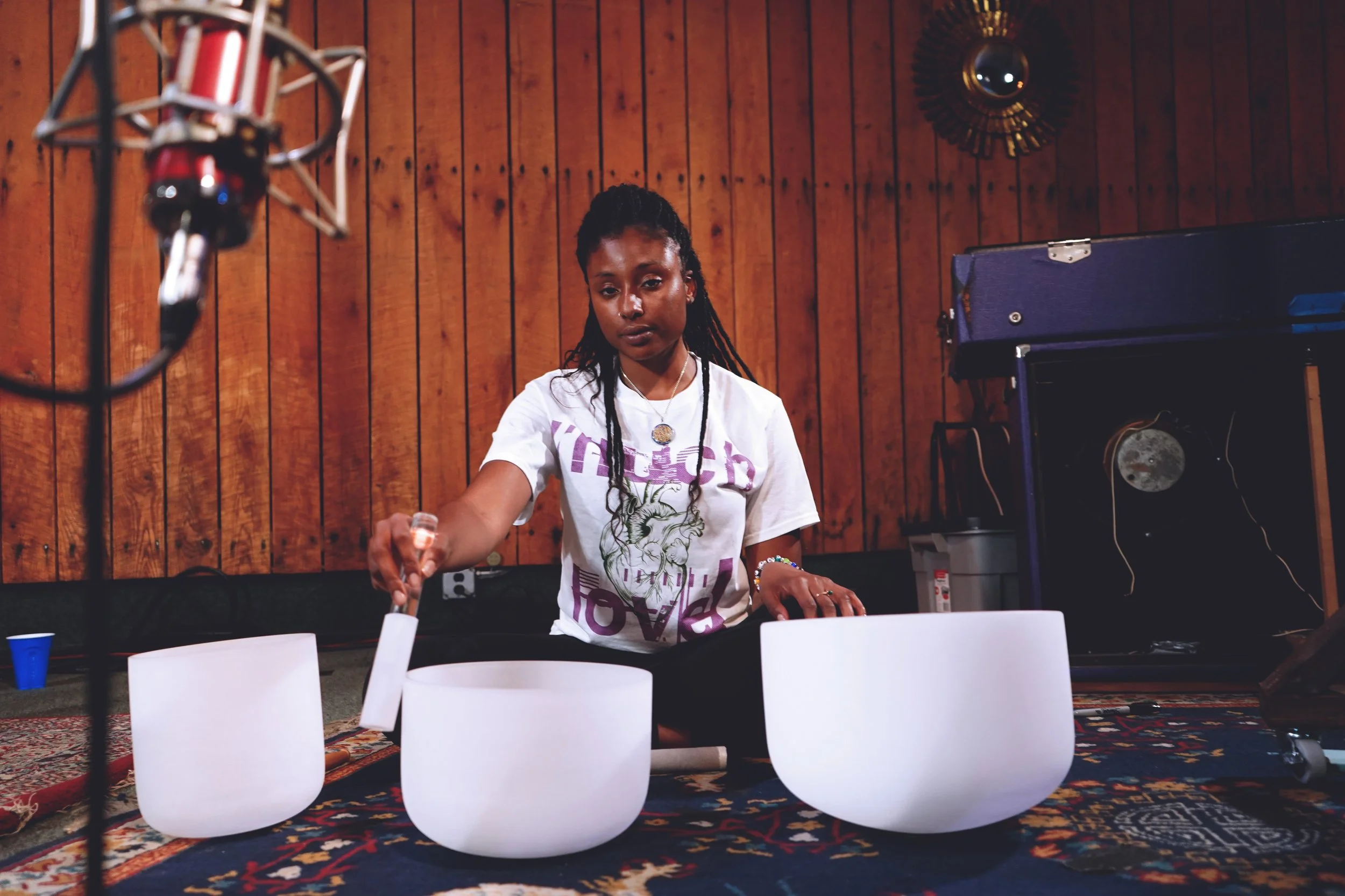 A Nalaverse instructor plays a soothing sound bath during an on-demand library video.