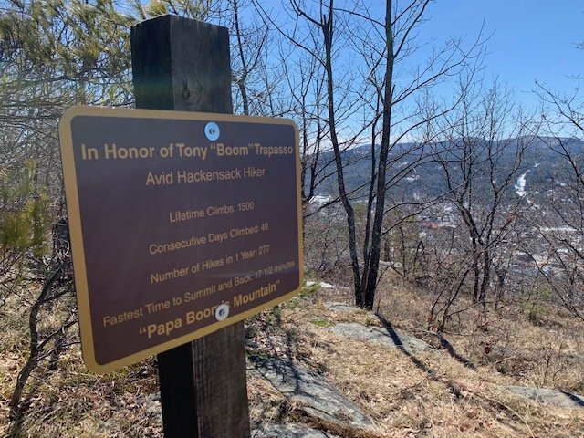 At the summit, a fitting tribute to a man who loved Hackensack Mountain and died at 61 after a valiant fight with ALS.