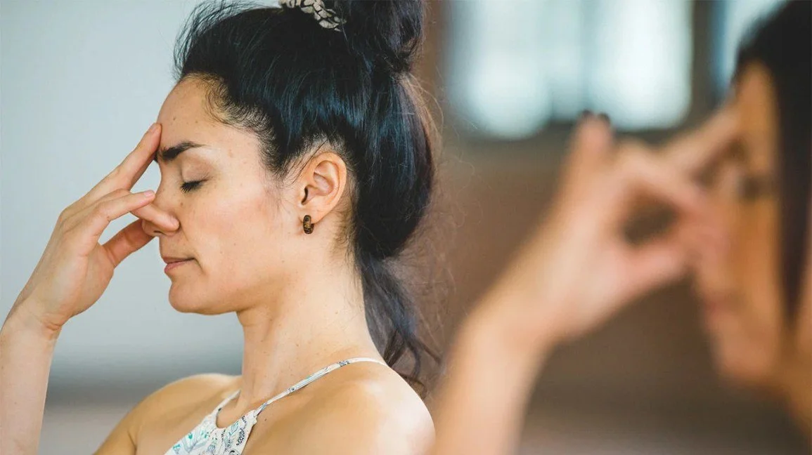 women doing yoga breath work