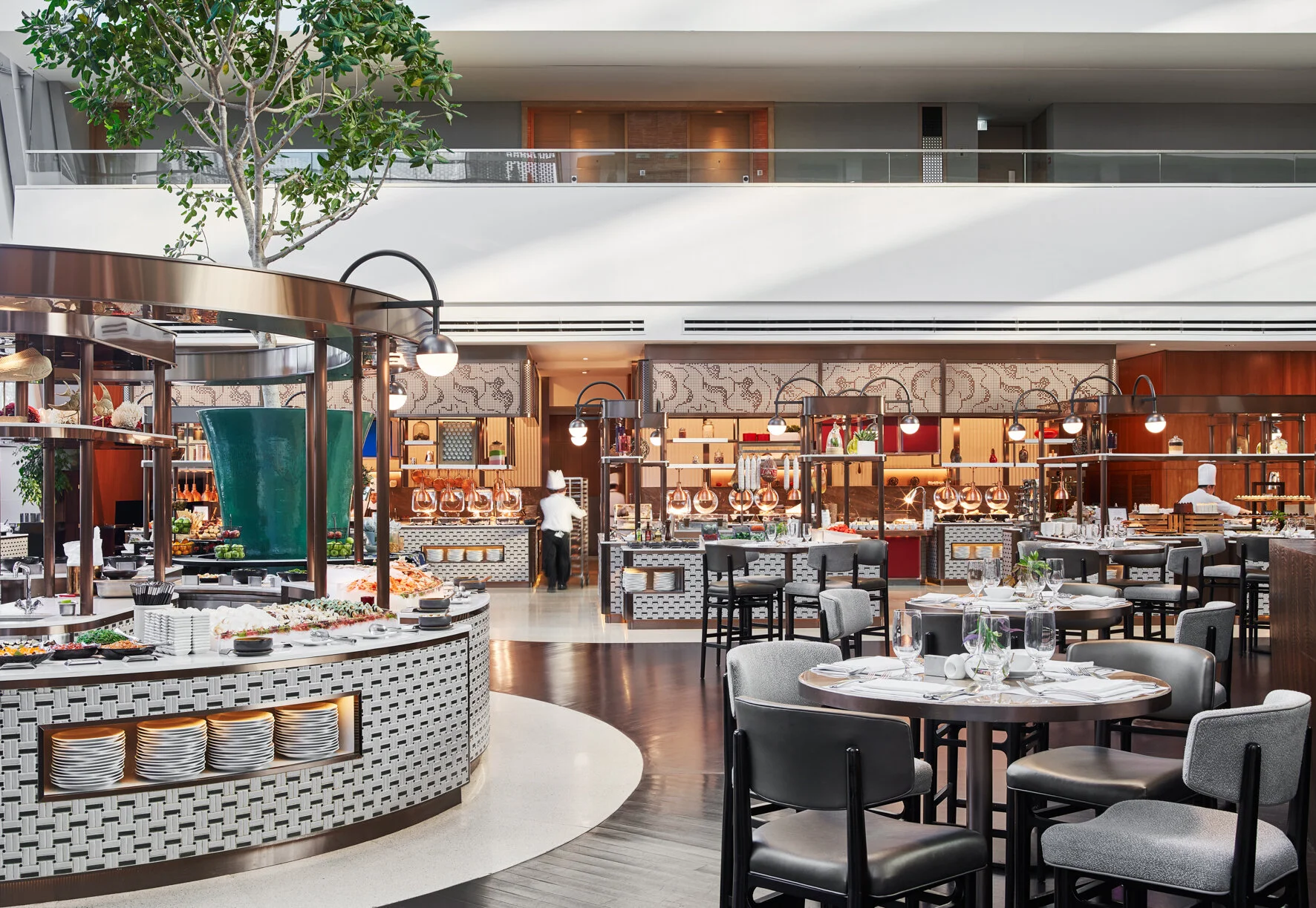 Buffet stations with perforated panels inspired by terraced pools in China