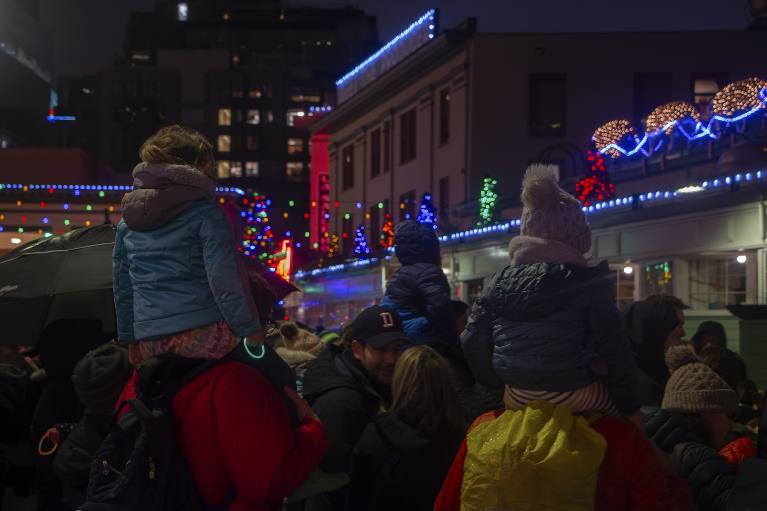Families bringing their children to spend time together during the 38th annual Great Figgy Pudding Caroling Competition in Pike Place Market Seattle, Wash. on Dec. 1, 2023.