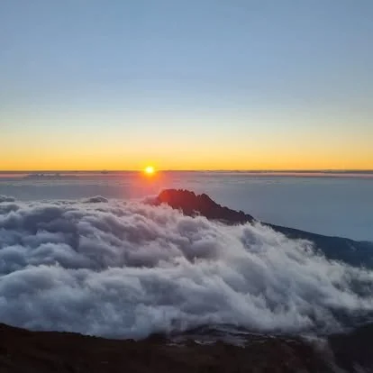 Kili summit brings this ethereal sunrise at high altitude. 