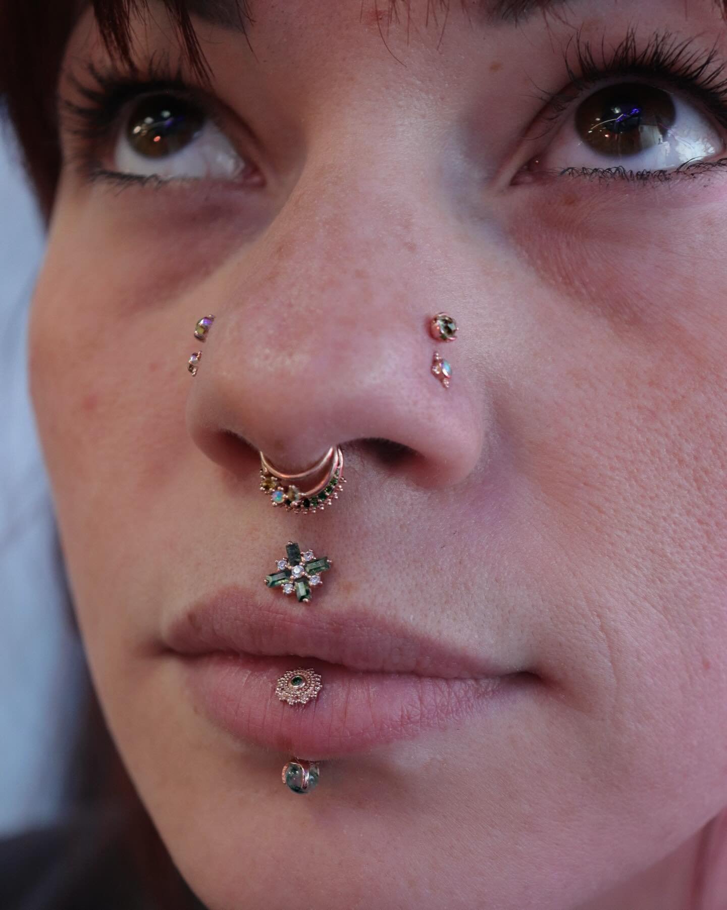 Vertical labret and stacked nostril piercings by @emerald.cowgirl 💚✨ all jewelry pictured is from @bvla + @buddhajewelryofficial 

We have a piercer on staff Tuesday through Saturday, noon-6pm! &bull; 

🥀@larosatattooco 
3307 S College Ave Unit 102