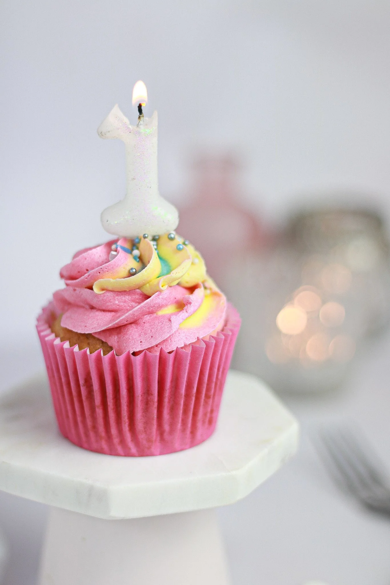 single pink and yellow cupcake 1st birthday