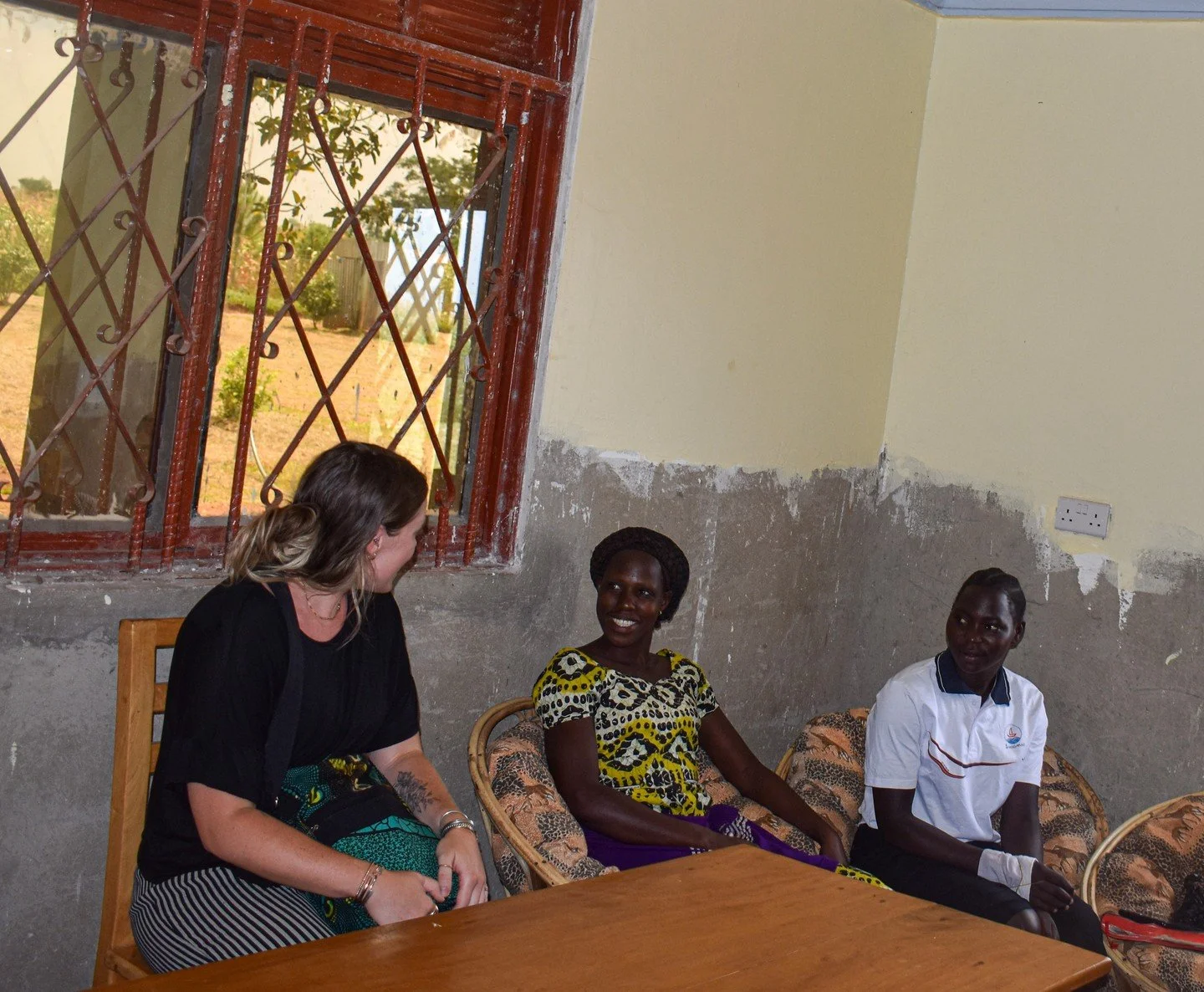 Seven years ago, YOU ARE was founded on one belief: people deserve to be seen, heard, and encouraged. 🩵⁠
⁠
This picture captures exactly that. Jess in Uganda in 2022...listening and believing. ⁠
⁠
That moment is who we are. And in 2023, we made the 