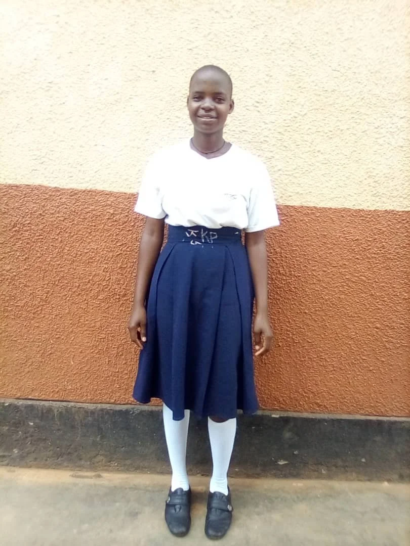 “My name is Prisca. I am 17 years old and in S2 class. My dream is to become a teacher.”
