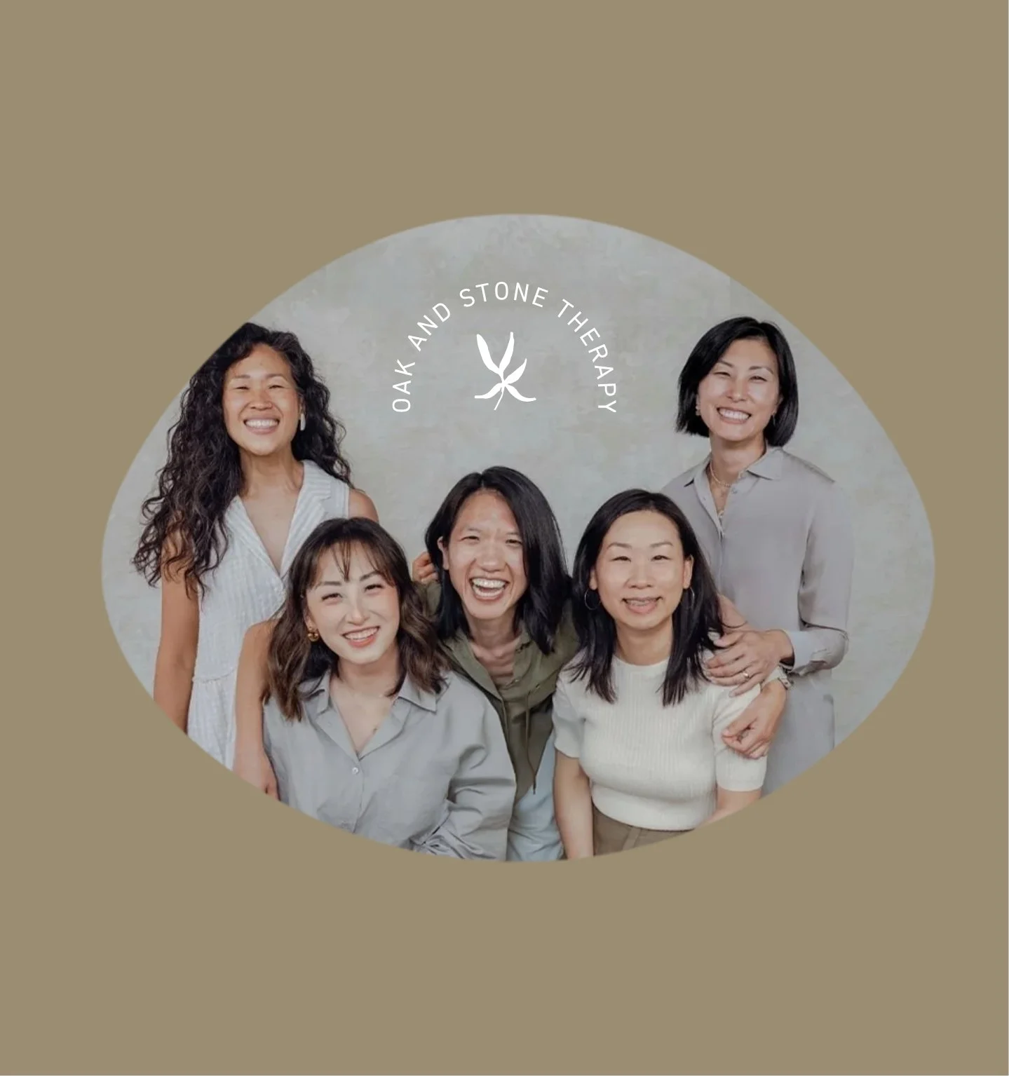 Group of six smiling women posing together in front of a light background with a logo that reads 'Oak and Stone Therapy' and features a leaf design.