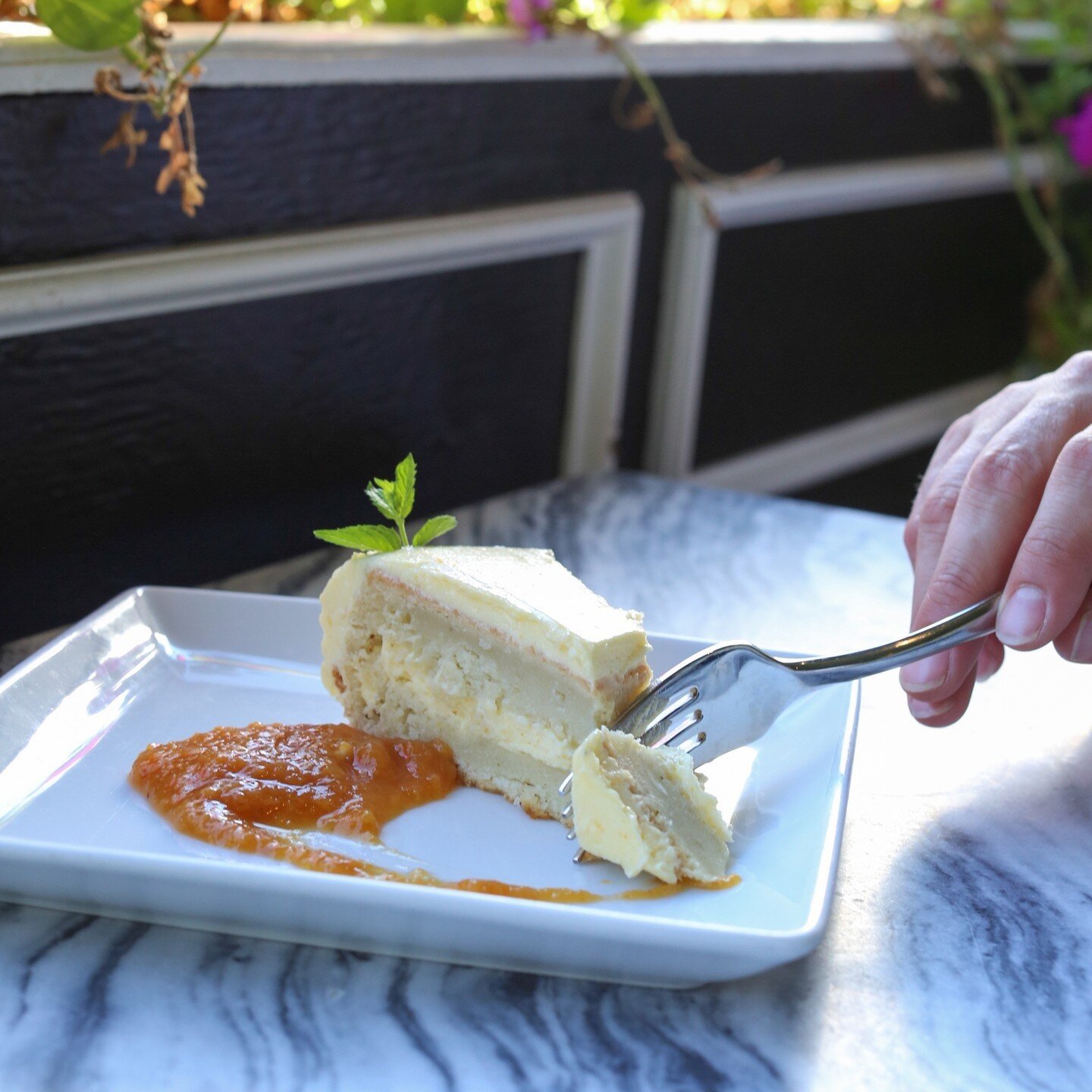 Chef Cole came up with the perfect summer dessert for the Restaurant Week menu. Lavender Cake with orange buttercream, stone fruit jam, and grandma Lila's mint. ⁠
⁠
Choose between that and our classic chocolate torte. 🤍