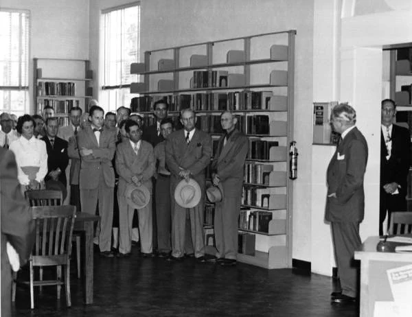 Governor Fuller Warren is at the right with his hand in his pocket in November 1951