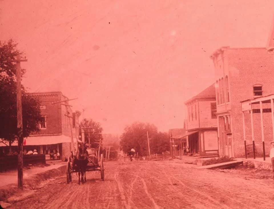 1 N Main Street is the taller building on the right side of this image