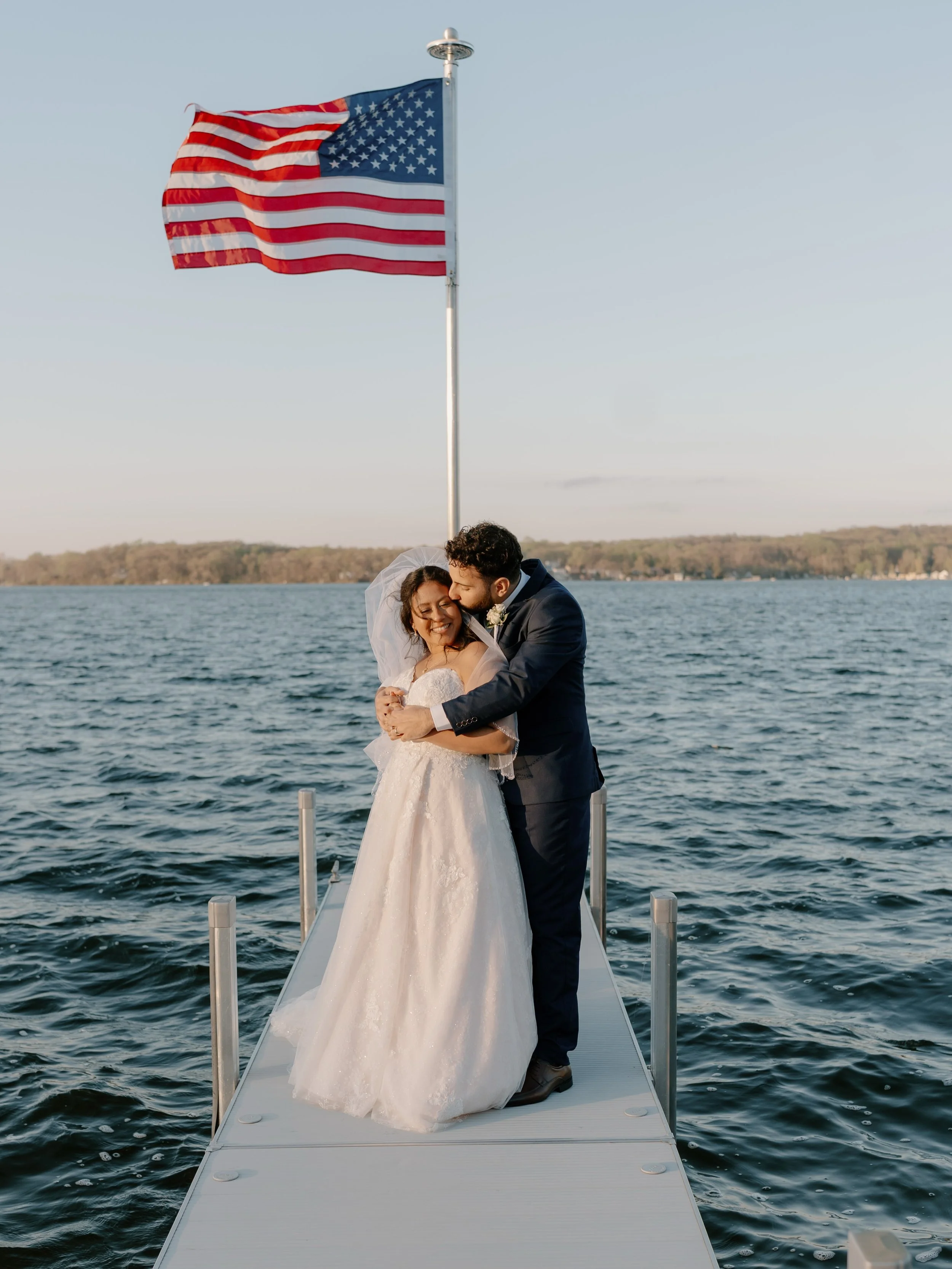 Mariah and Rafa: A love that crosses countries. These two celebrated their wedding day on Gun Lake surrounded by the most caring and fun friends and family. I had only just met them in person the week before but I already felt like I had known them m
