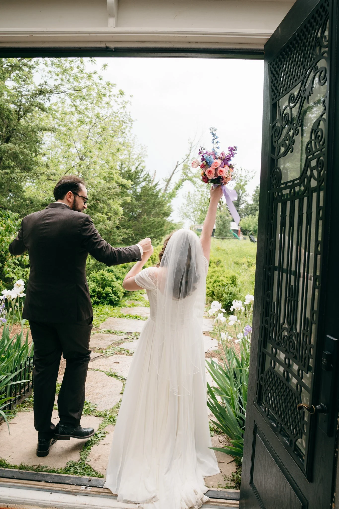 alyssaleicht-emily-zach-wedding-iris-aisle-2026-05-16-03593.jpg