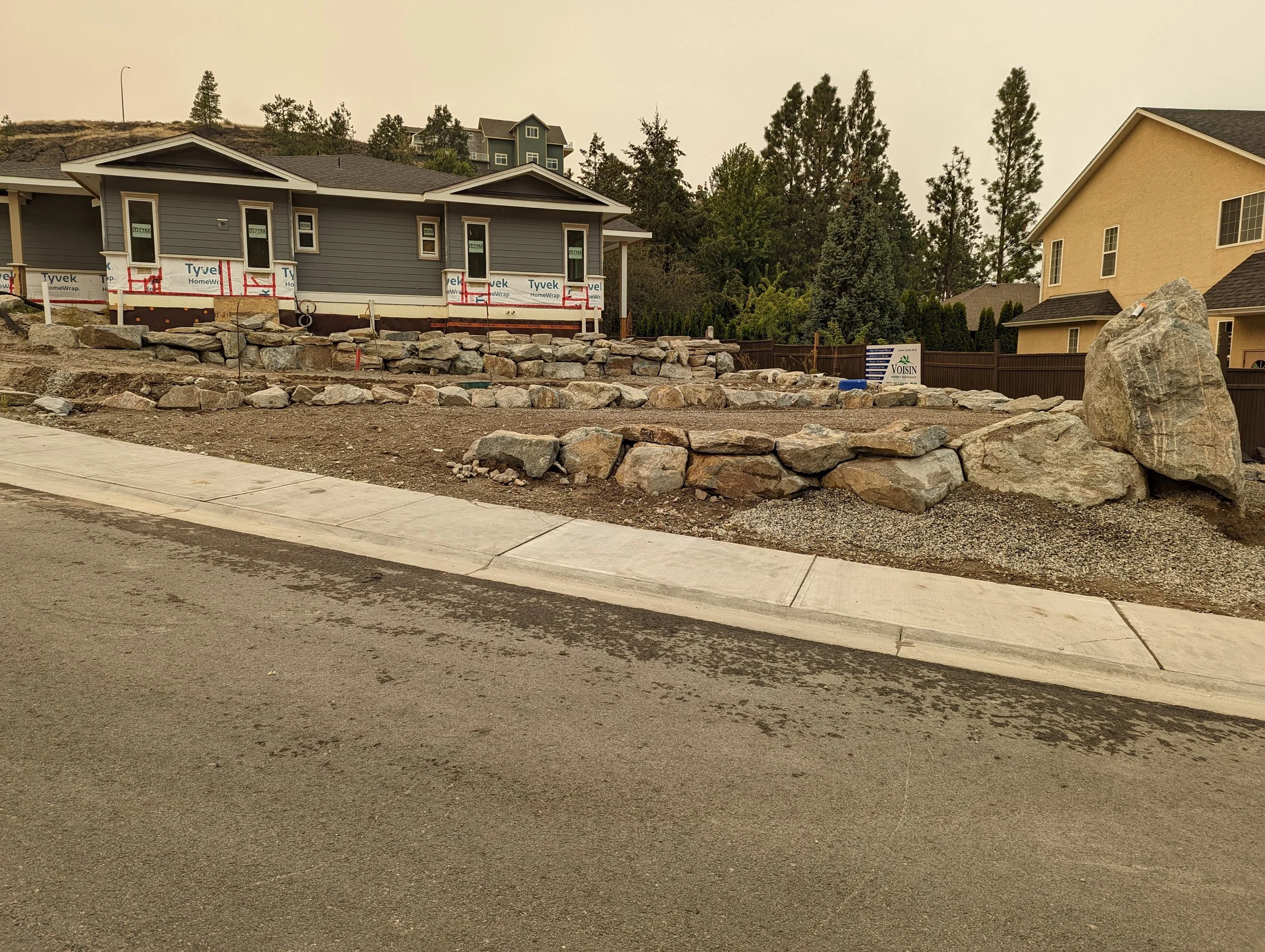 landscaping after rock wall build