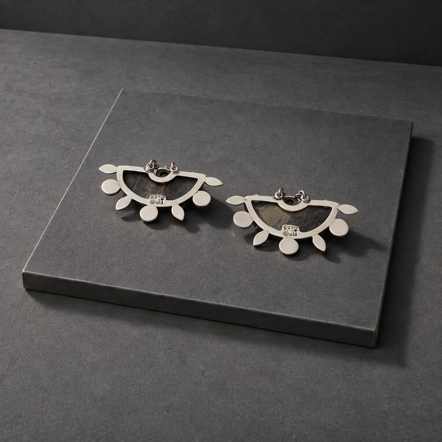 magnific__place-the-earrings-in-img1-in-the-background-in-im__40250.png