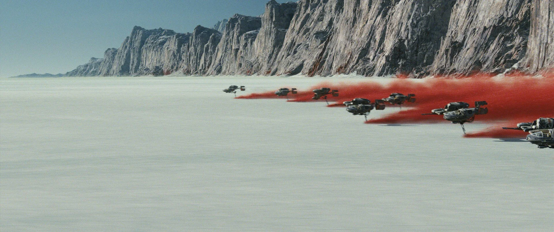 Speeders cross the planet of Crait