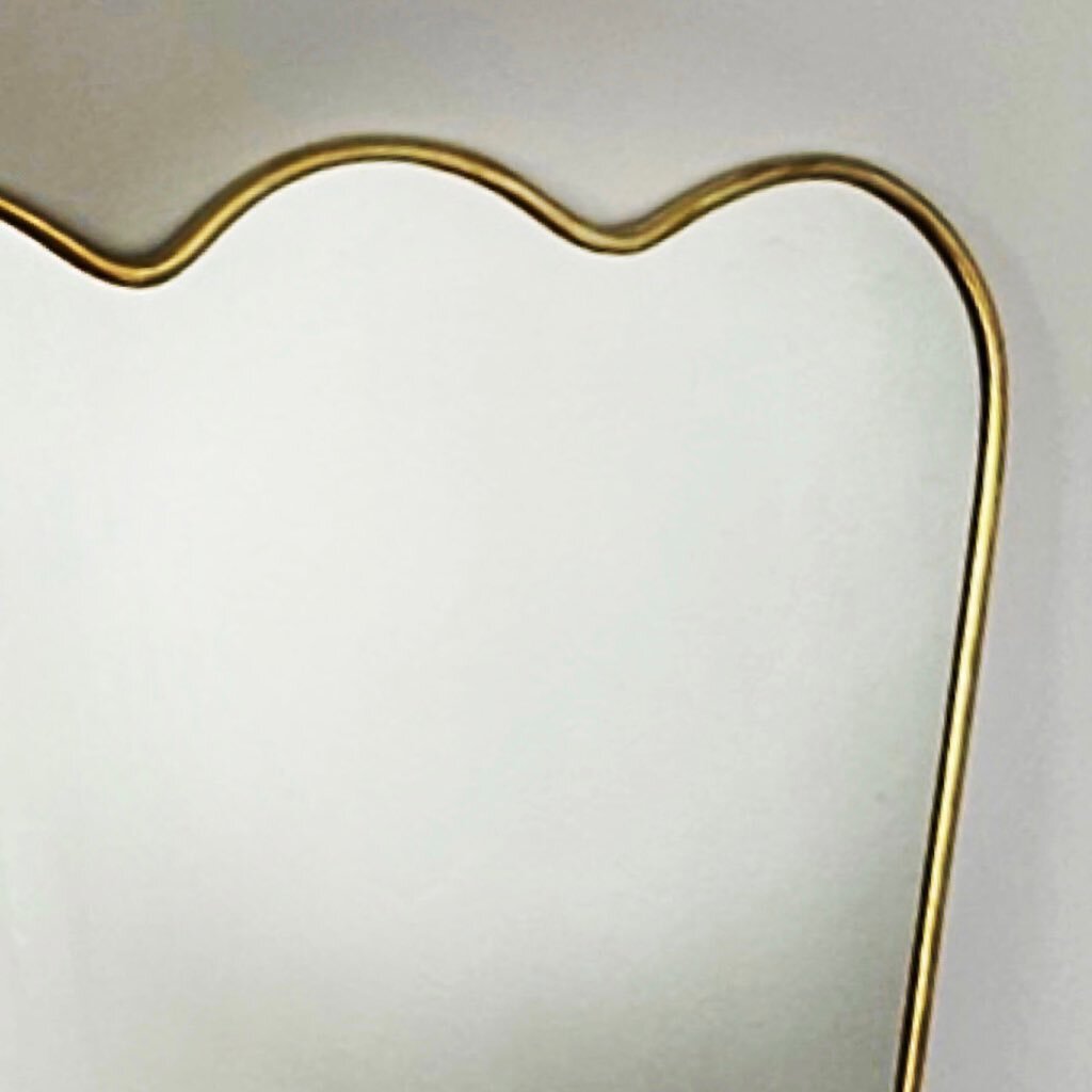 Through the looking glass: the brass edition. Made in Marrakech, this artisanal Wavy Wall Mirror will make you stop and stare. Here&rsquo;s looking at you, kid.

Dimensions: H90cm, W75cm (widest)

2 &times; Available
Sold Separately