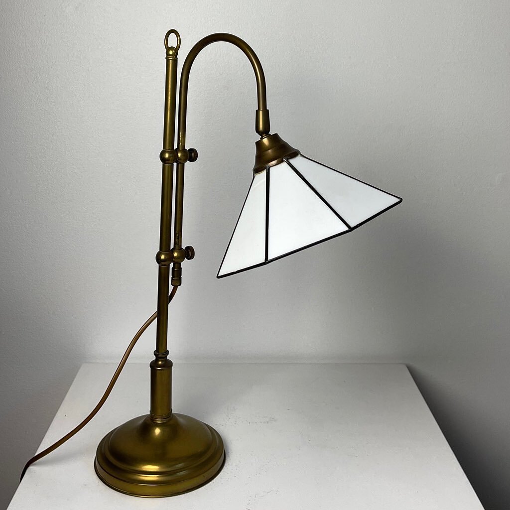 Daydreaming about the ideal work-from-home setup? Look no further than this Tiffany style brass table lamp circa 1970. Just add leather bound books and the smell of rich mahogany to finish the look.

Dimensions H55 cm, Diameter 19 cm

Available via o