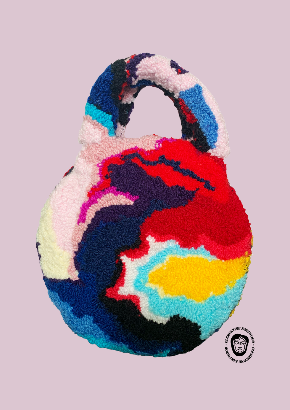Round abstract tufted handbag
