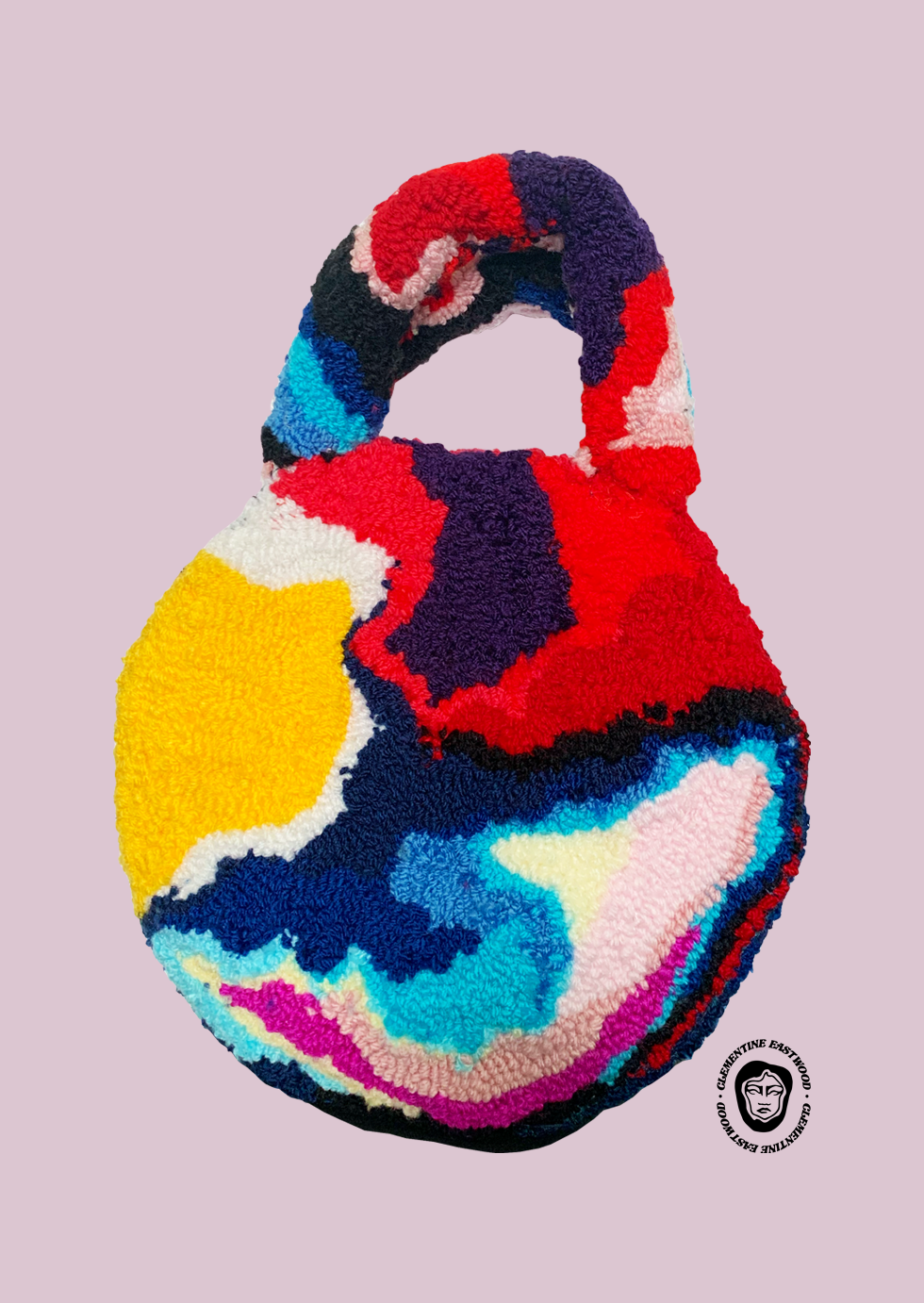 Round abstract tufted handbag
