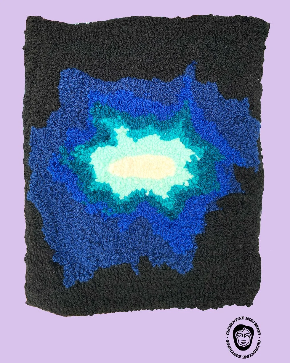 "Be my light in the dark" acrylic yarn loop pile 30 cm x 25 cm. This rug is designed by Clementine Eastwood